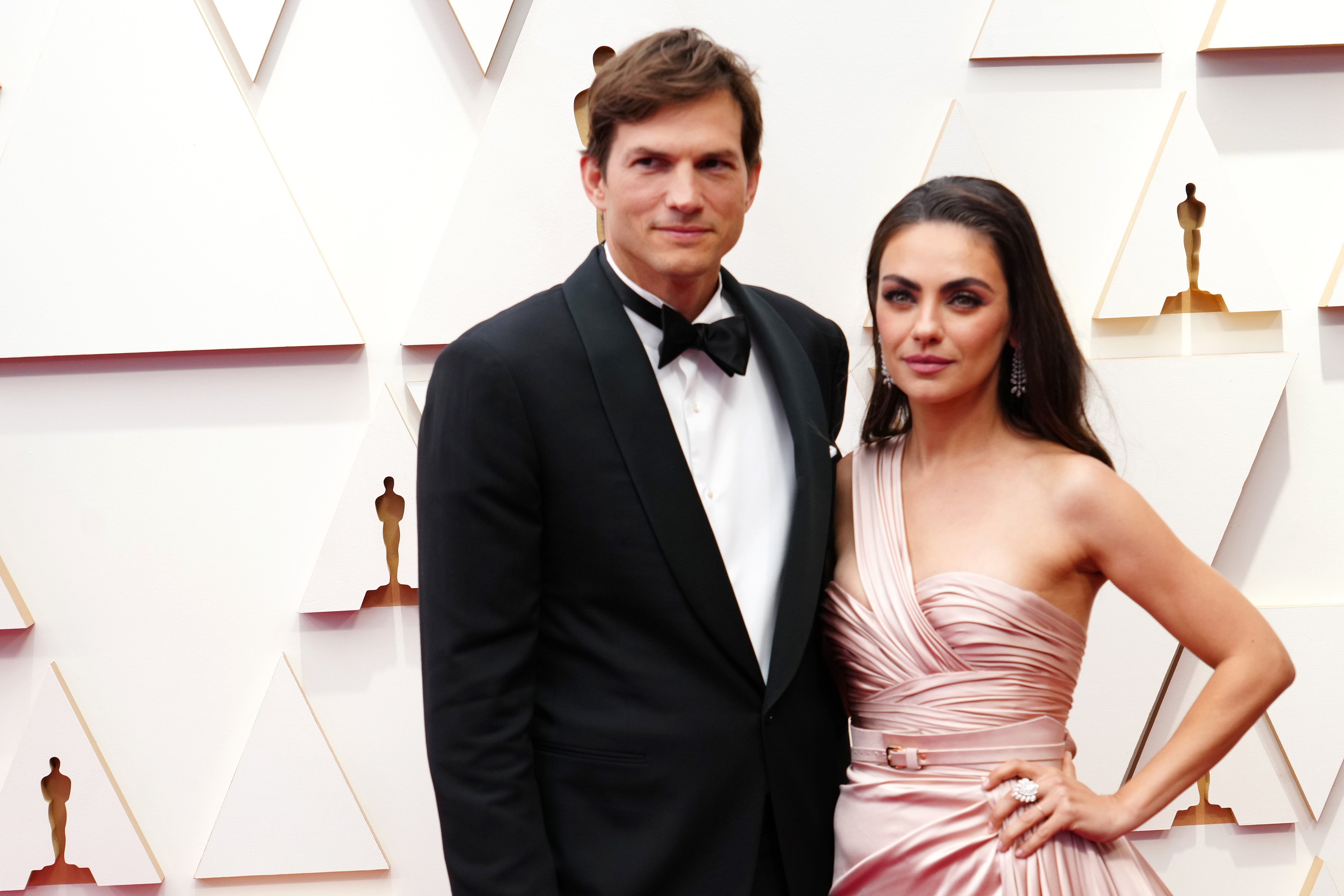  Ashton Kutcher and Mila Kunis attend the 94th Annual Academy Awards at Hollywood and Highland on March 27, 2022 | Source: Getty  Images 
