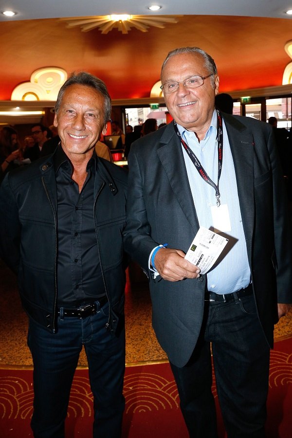 Le producteur Gérard Louvin et son époux Daniel Moyne | Photo : Getty Images