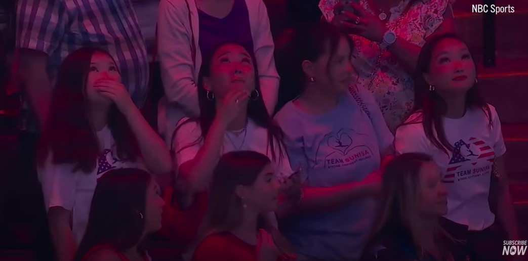 Fans and family supporting Suni Lee after making the US Olympics Team in a video uploaded on July 1, 2024 | Source: YouTube/Access Hollywood