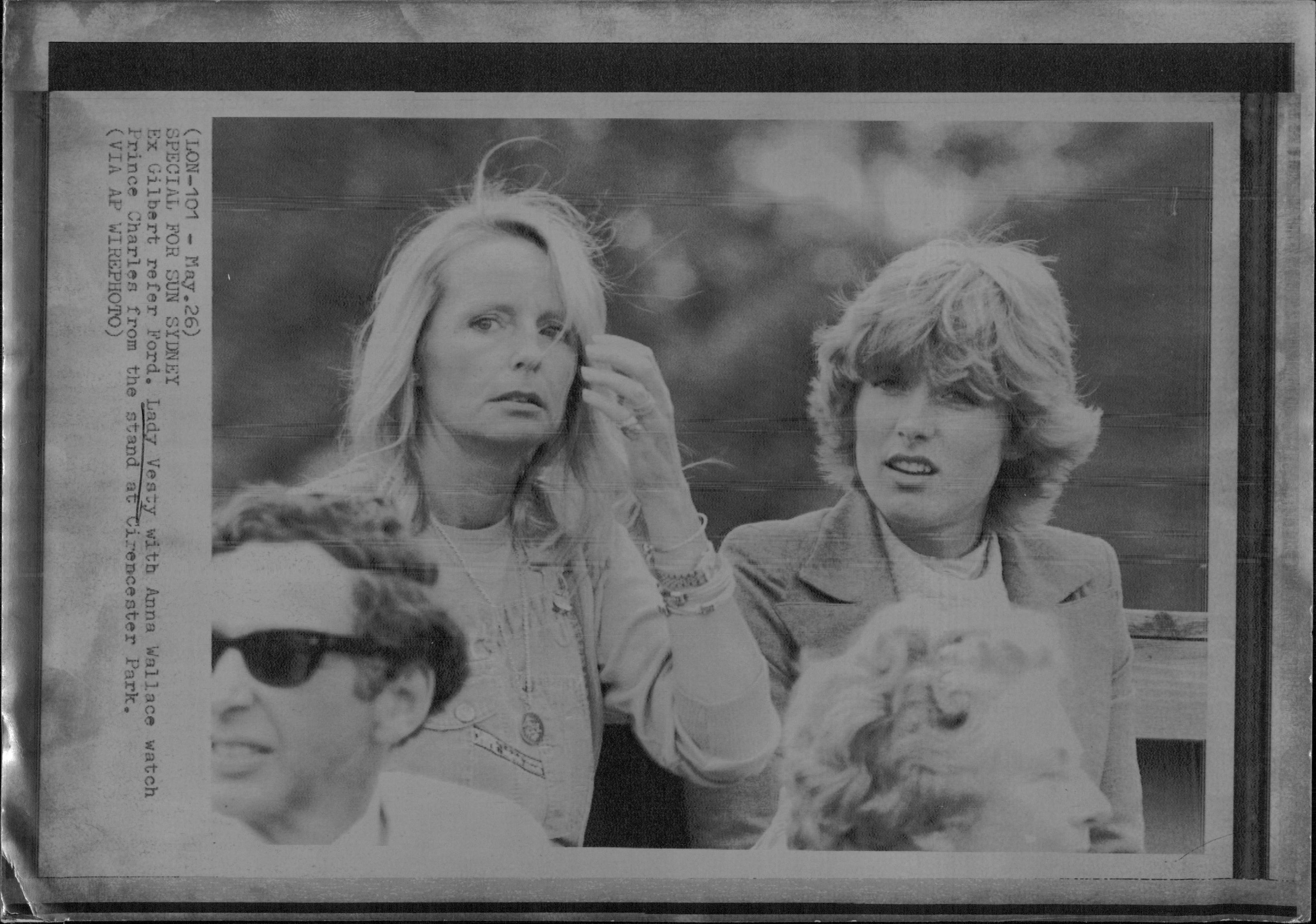 Lady Vesty and Anna Wallace watch Prince Charles at Cirencester Park. May 27, 1980. | Source: Getty Images
