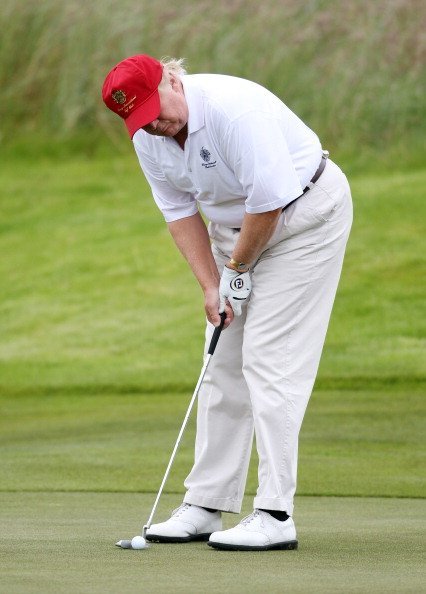 Donald Trump plays a round of golf after the opening of The Trump International Golf Links Course on July 10, 2012 in Balmedie, Scotland | Photo: Getty Images