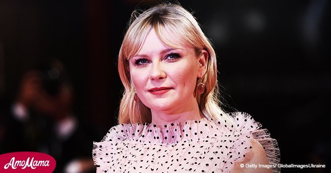 Pregnant Kirsten Dunst flashes her slender legs in flowing pink mini dress at her recent outing