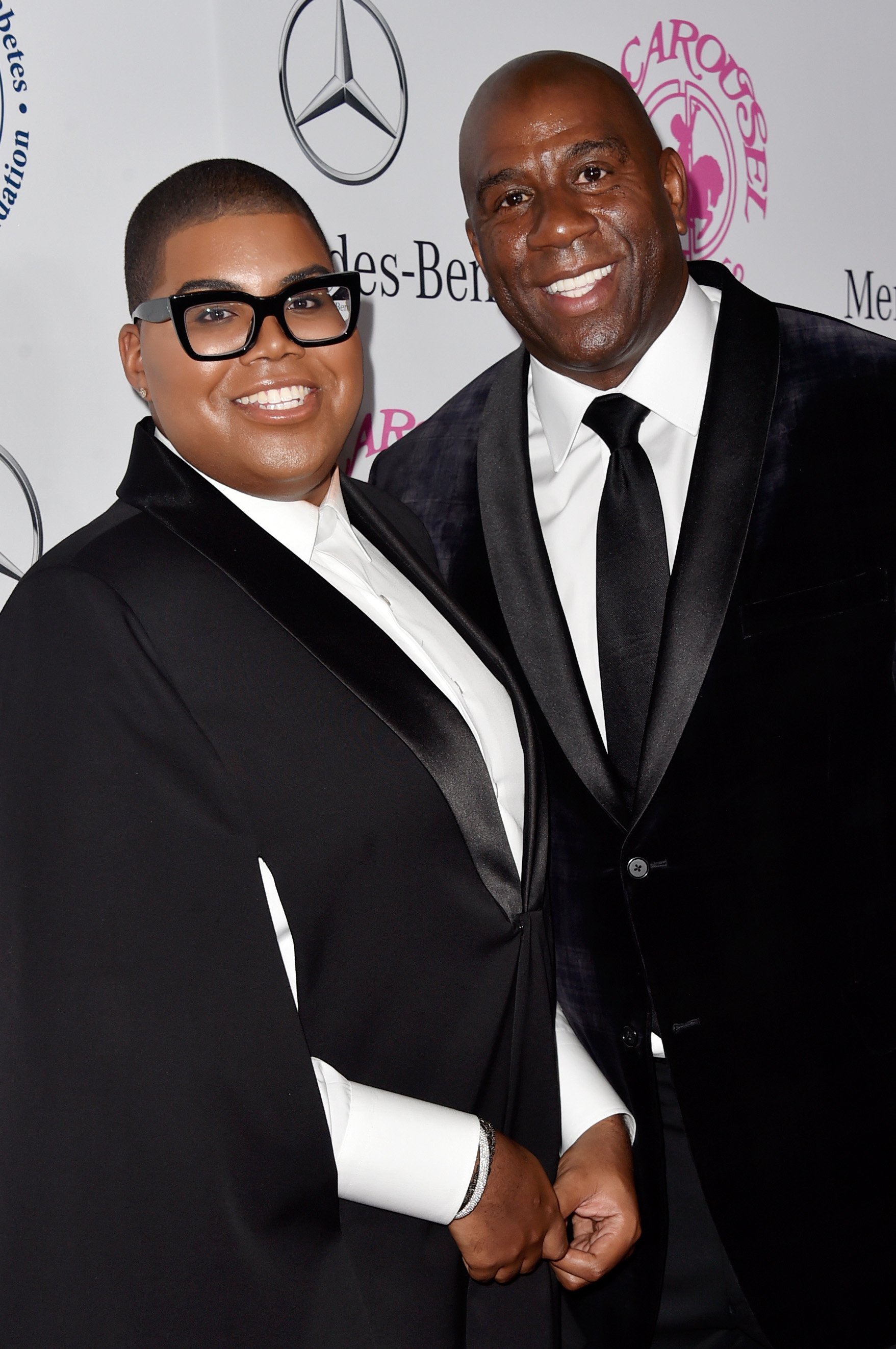 EJ Johnson and his father Magic Johnson at the 2014 Carousel of Hope Ball on October 11, 2014 in Beverly Hills, California | Source: Getty Images