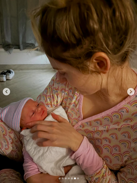 Meghan Trainor sharing a tender moment with Mikey Moon Trainor. | Source: Instagram/meghantrainor and darylsabara