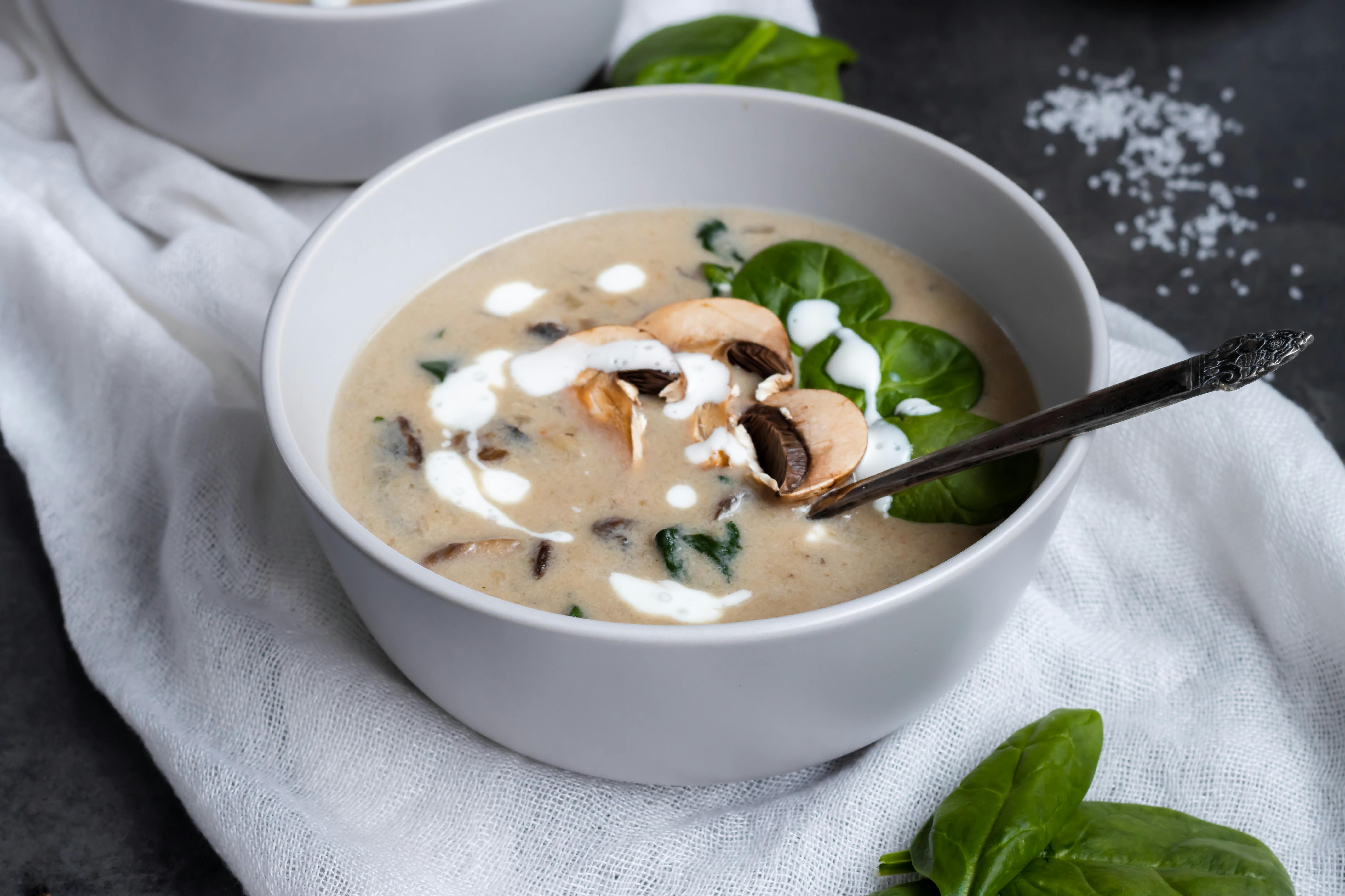 Mushroom soup with basil garnish | Source: Pexels