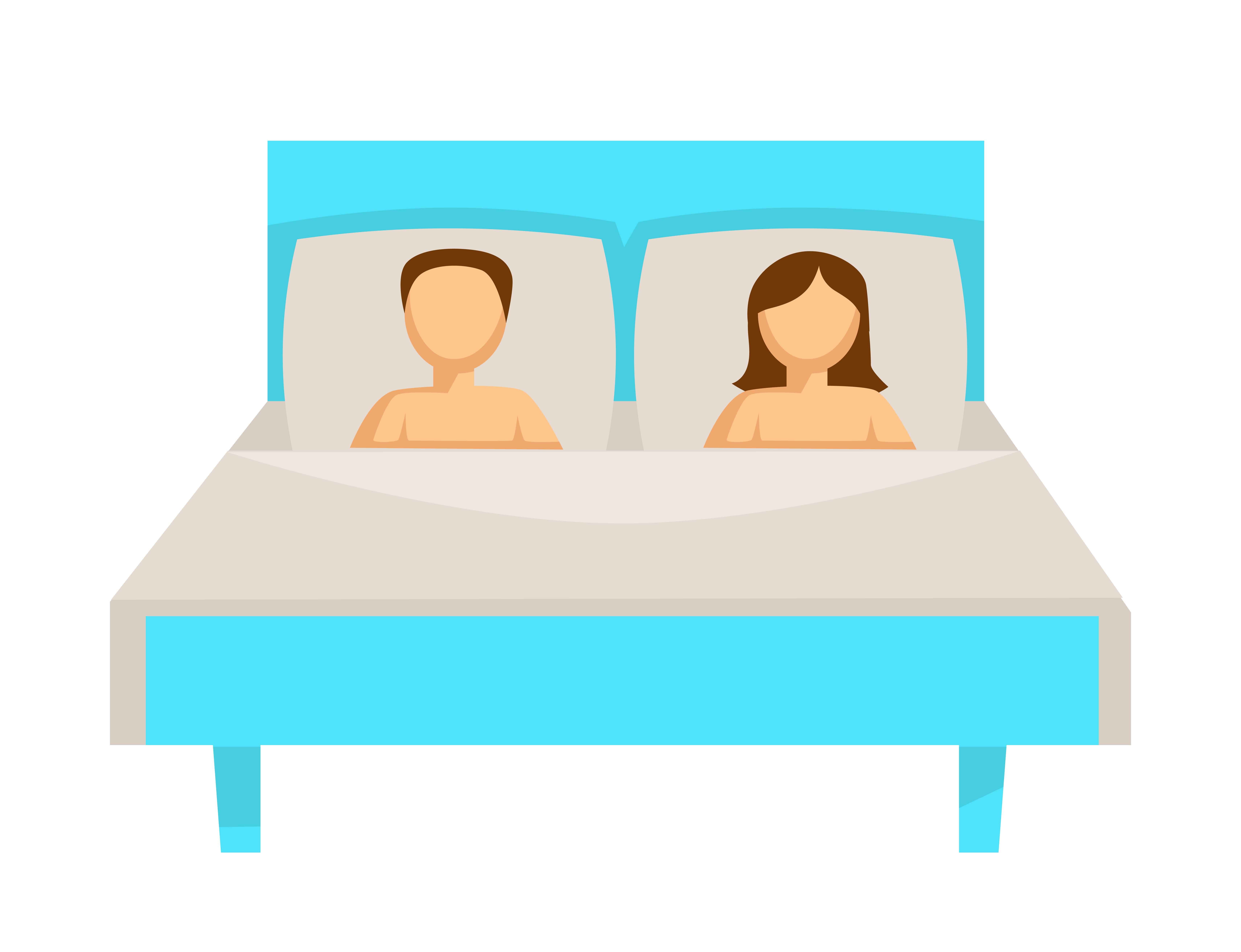 Image d'un couple dans un lit. | Source : Shutterstock