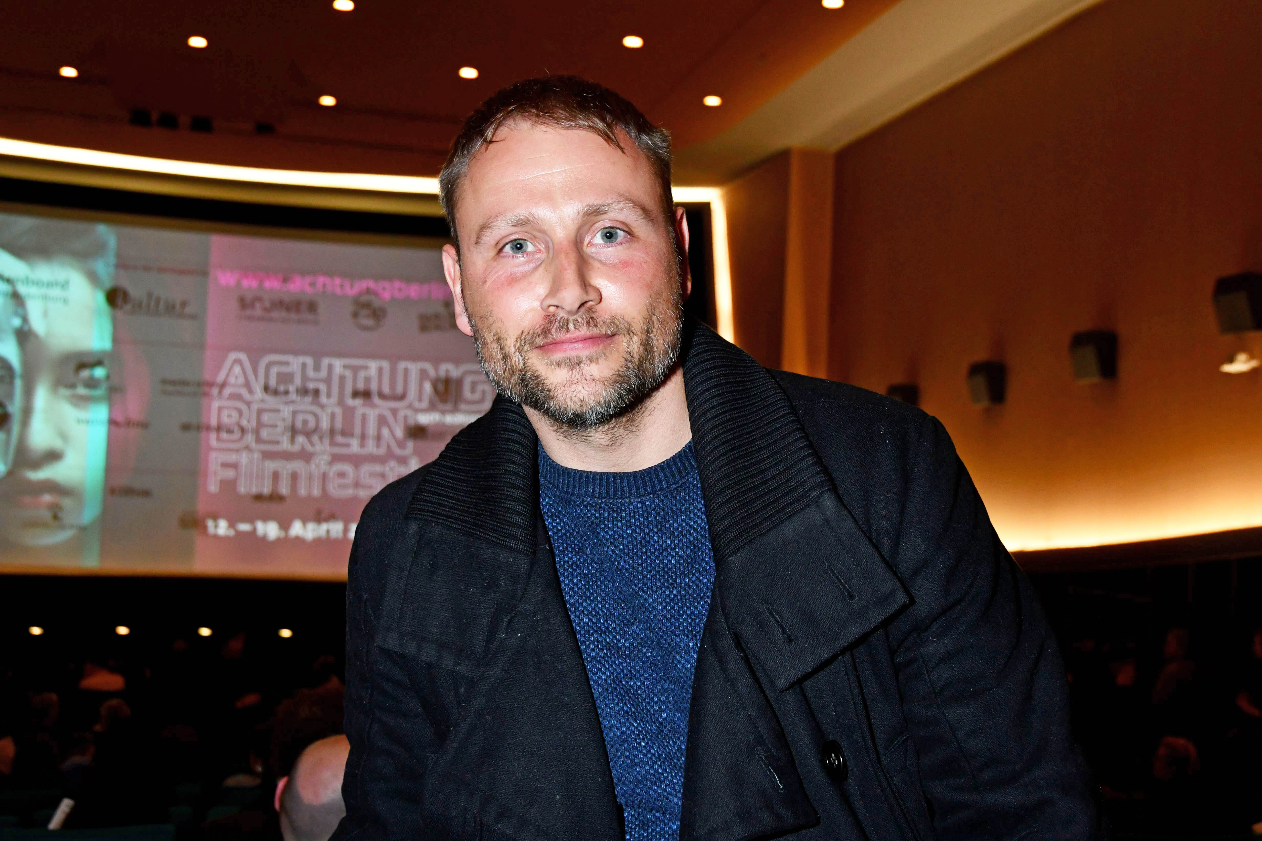 Max Riemelt during the Achtung Berlin film festival opening at Colosseum, on April 12, 2023, in Berlin, Germany. | Source: Getty Images