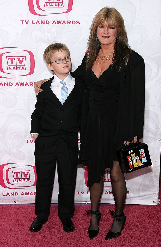 Susan Olsen and her son Micahel Markwell attend the 5th Annual TV Land Awards in Santa Monica, California on April 14, 2007 | Photo: Getty Images