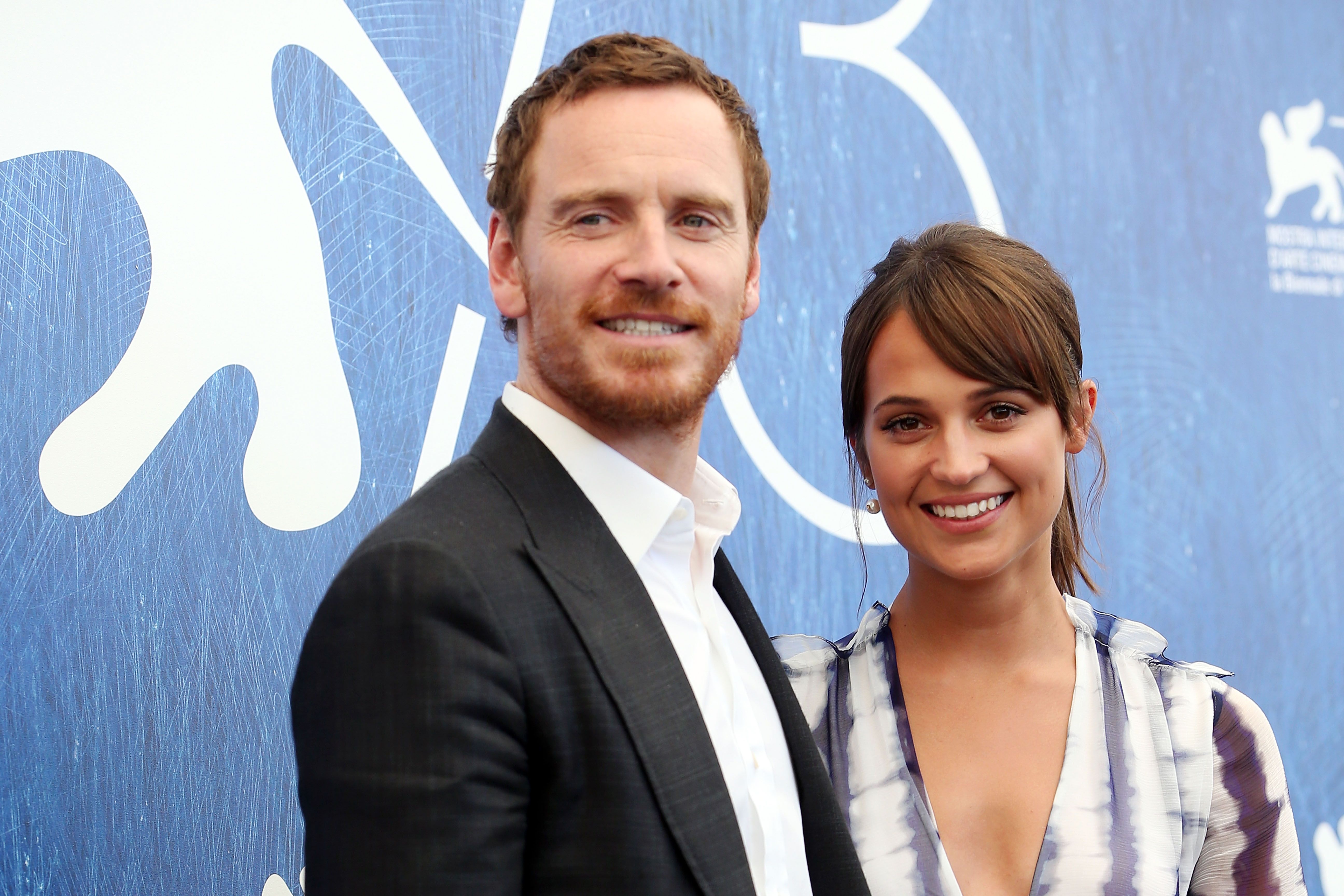 Actors Alicia Vikander and Michael Fassbender at a photocall for 'The Light Between Oceans' during the 73rd Venice Film Festival on September 1, 2016 | Photo: Getty Images