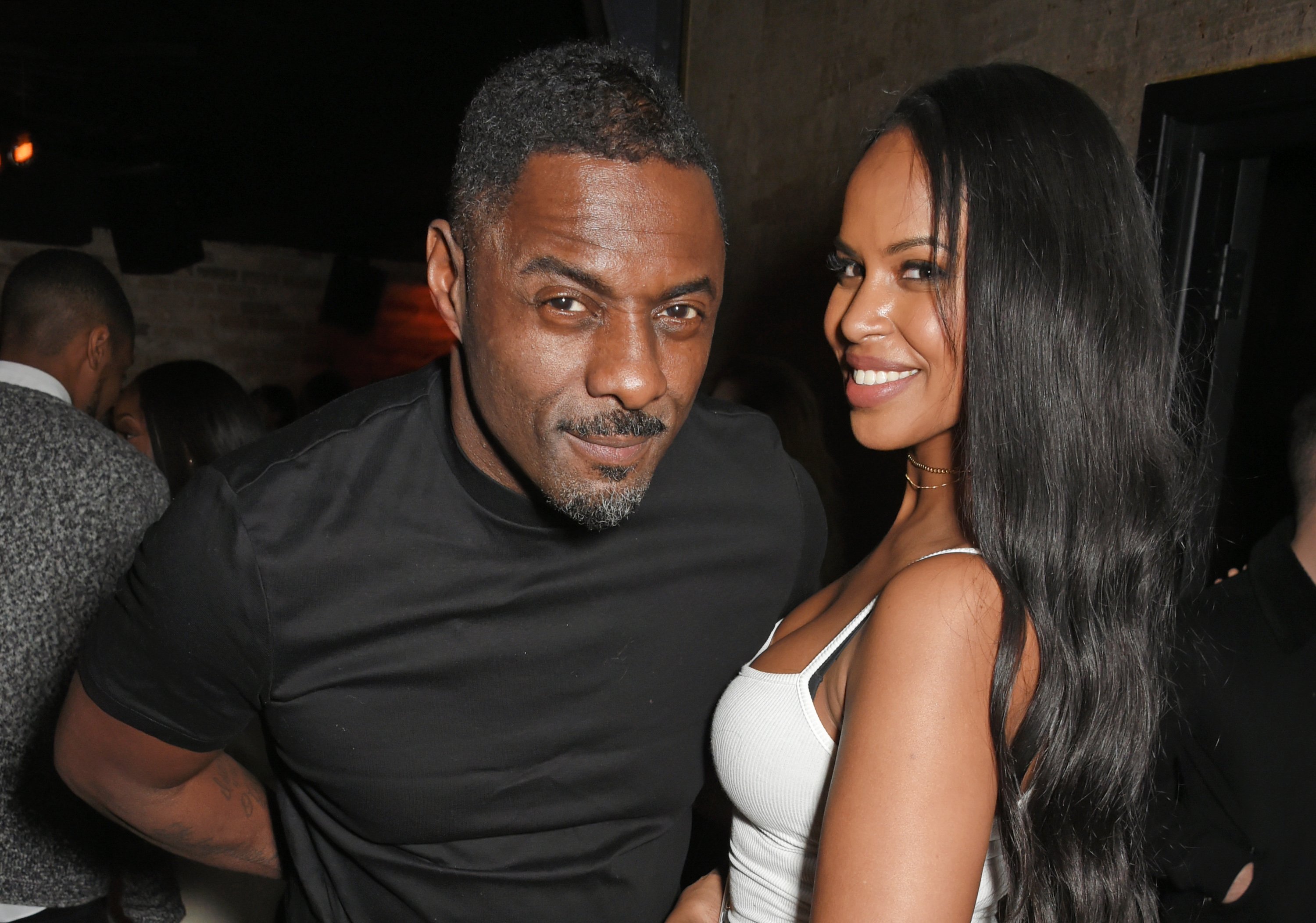 Idris Elba and Sabrina Dhowre attends a Christmas Party in London, England on December 9, 2017 | Photo: Getty Images