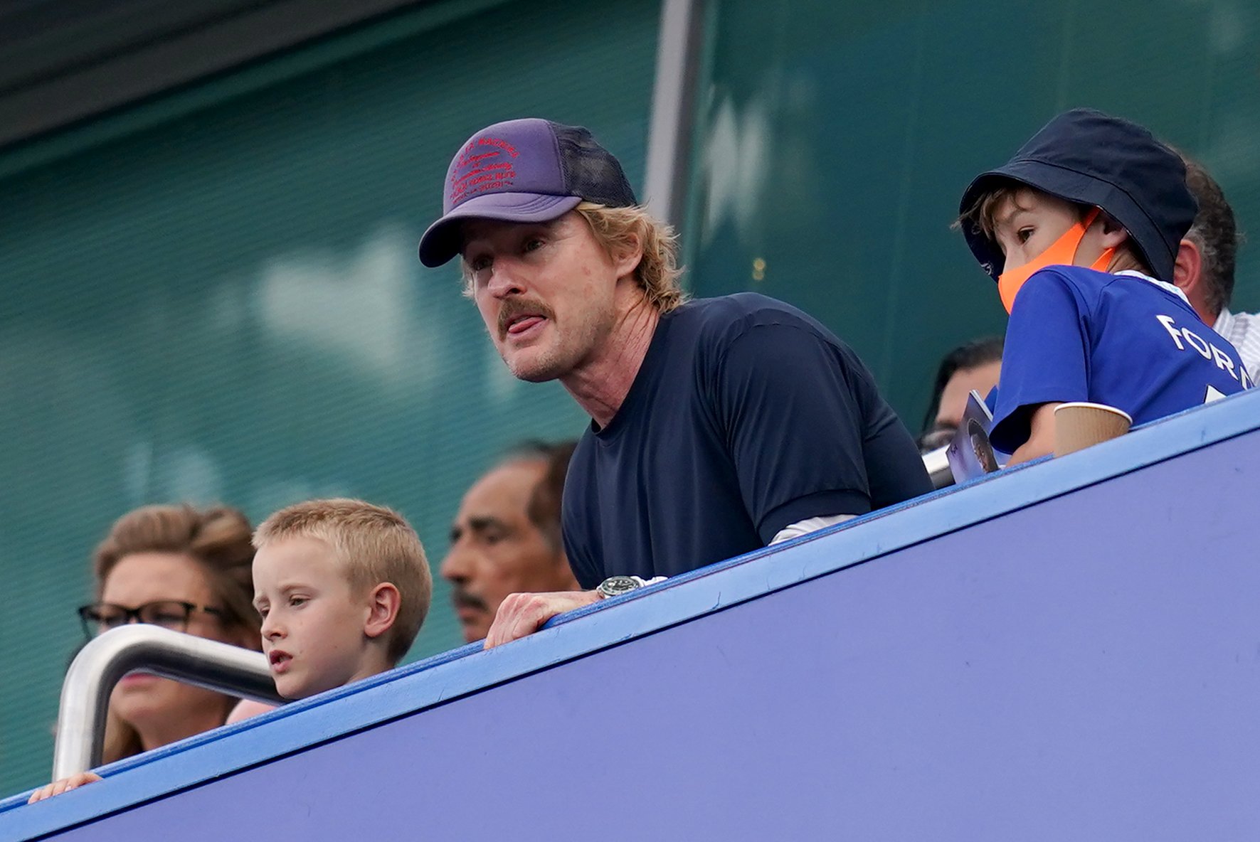 Actor Owen Wilson pictured watching play from the stands during the Premier League match at Stamford Bridge on August 14, 2022 in London | Source: Getty Images
