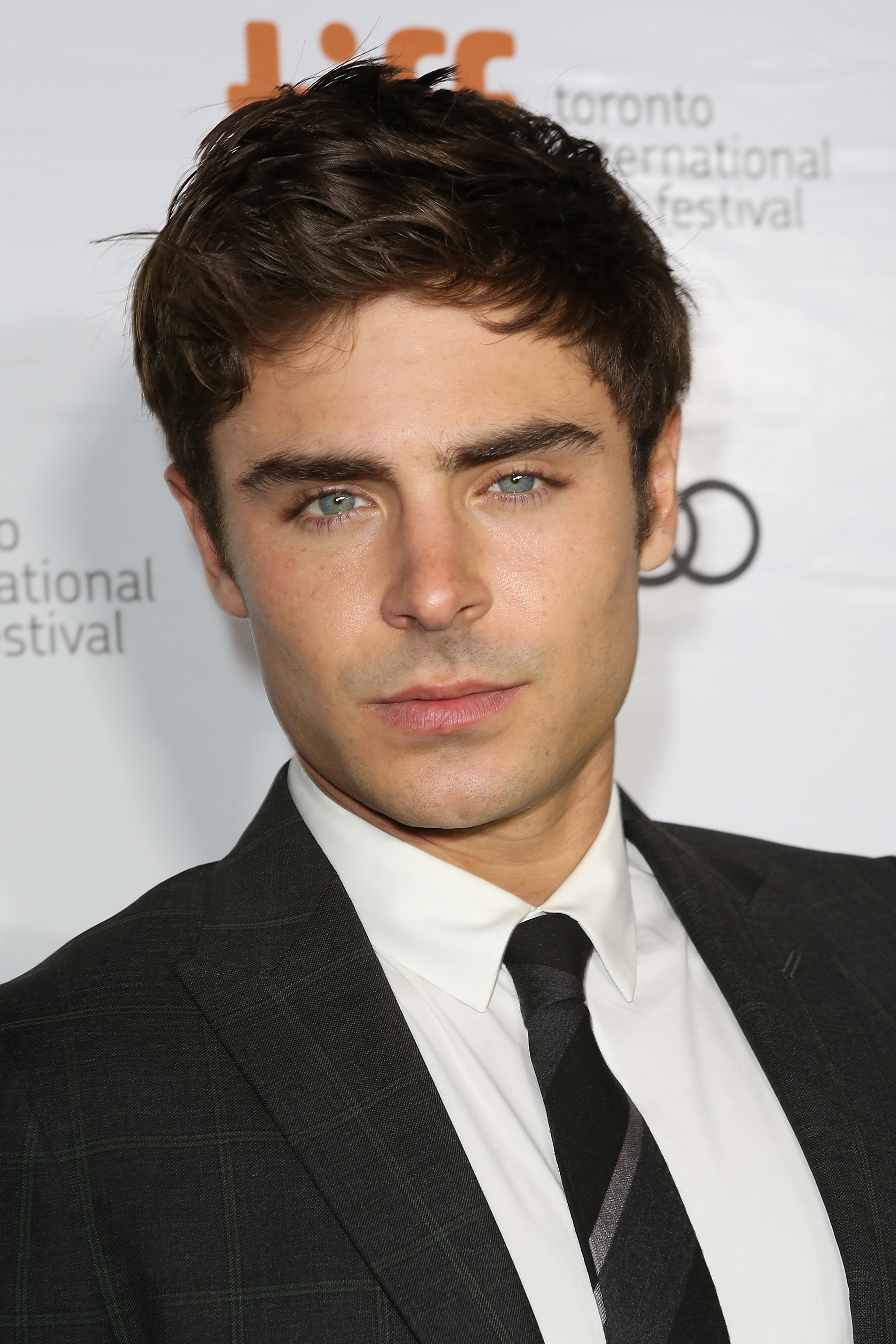 Zac Efron at the Tiff Film Festival for "Parkland" on September 6, 2013, in Toronto, Canada | Source: Getty Images