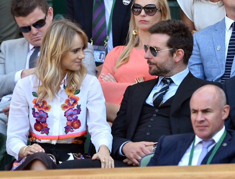 Suki Waterhouse and Bradley Cooper at Wimbledon on July 4, 2014 in London, England | Photo: Getty Images