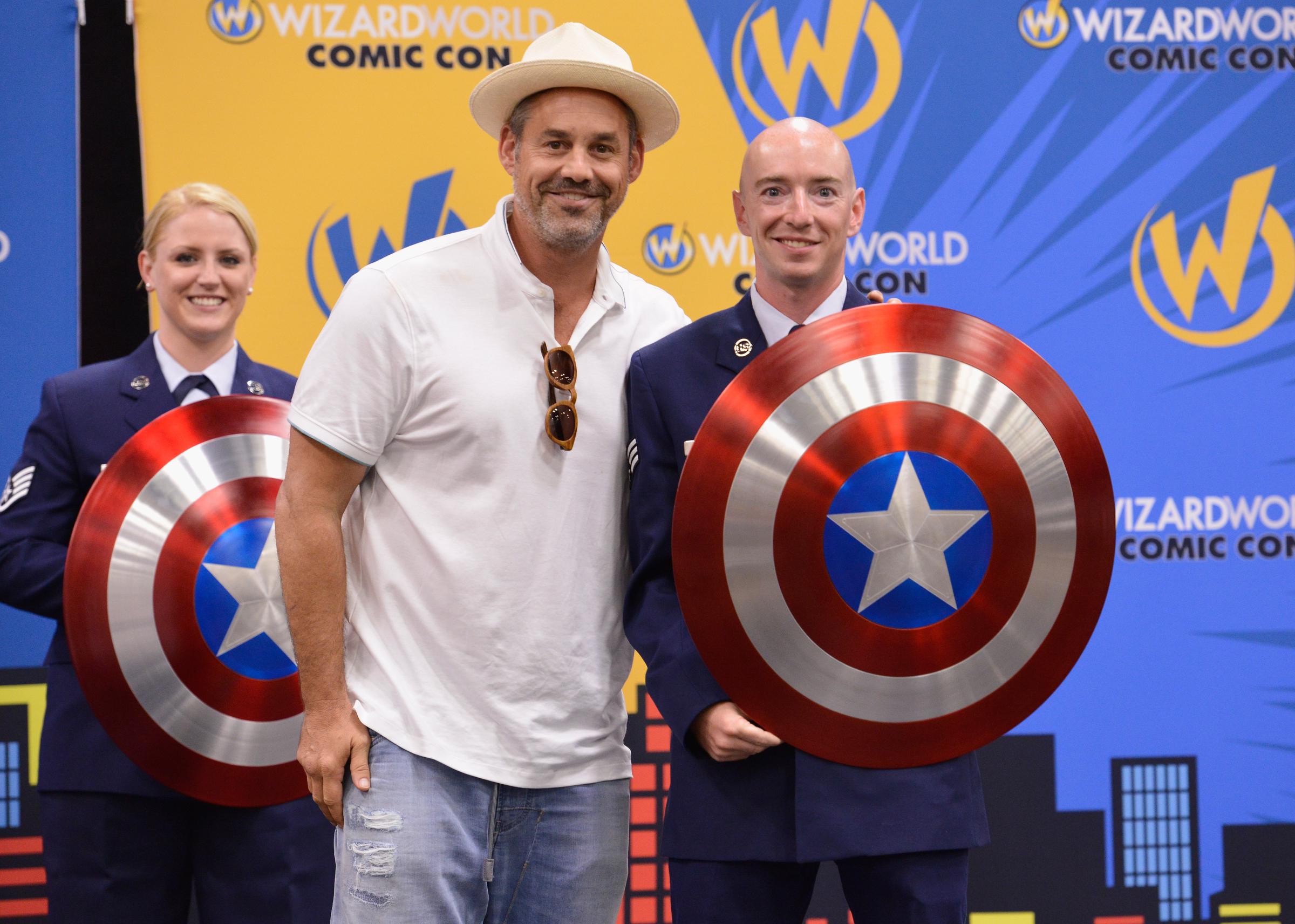Nicholas Brendon and Senior Airman Thomas Morris pose for photo during Wizard World Columbus Hosts Heroes Honoring Heroes event on July 29, 2016 in Columbus, Ohio.