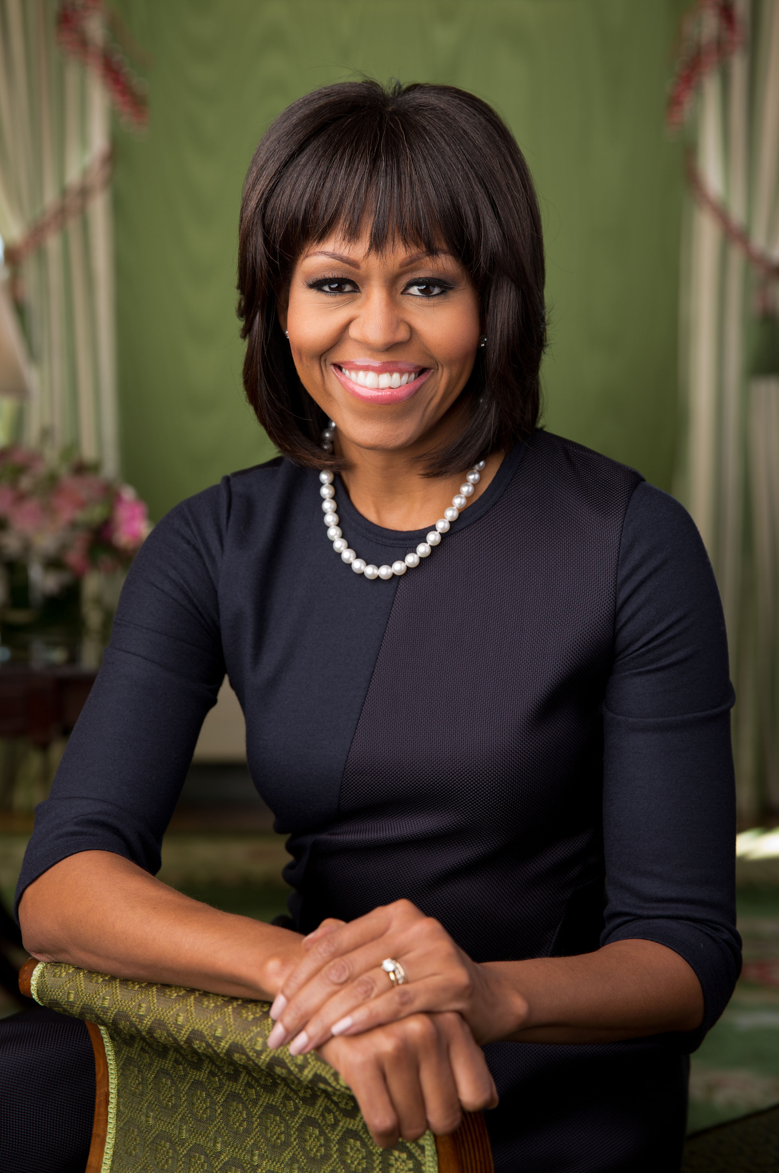 Michelle Obama poses in the Green Room of the White House on February 20, 2013, in Washington, D.C. | Source: Getty Images