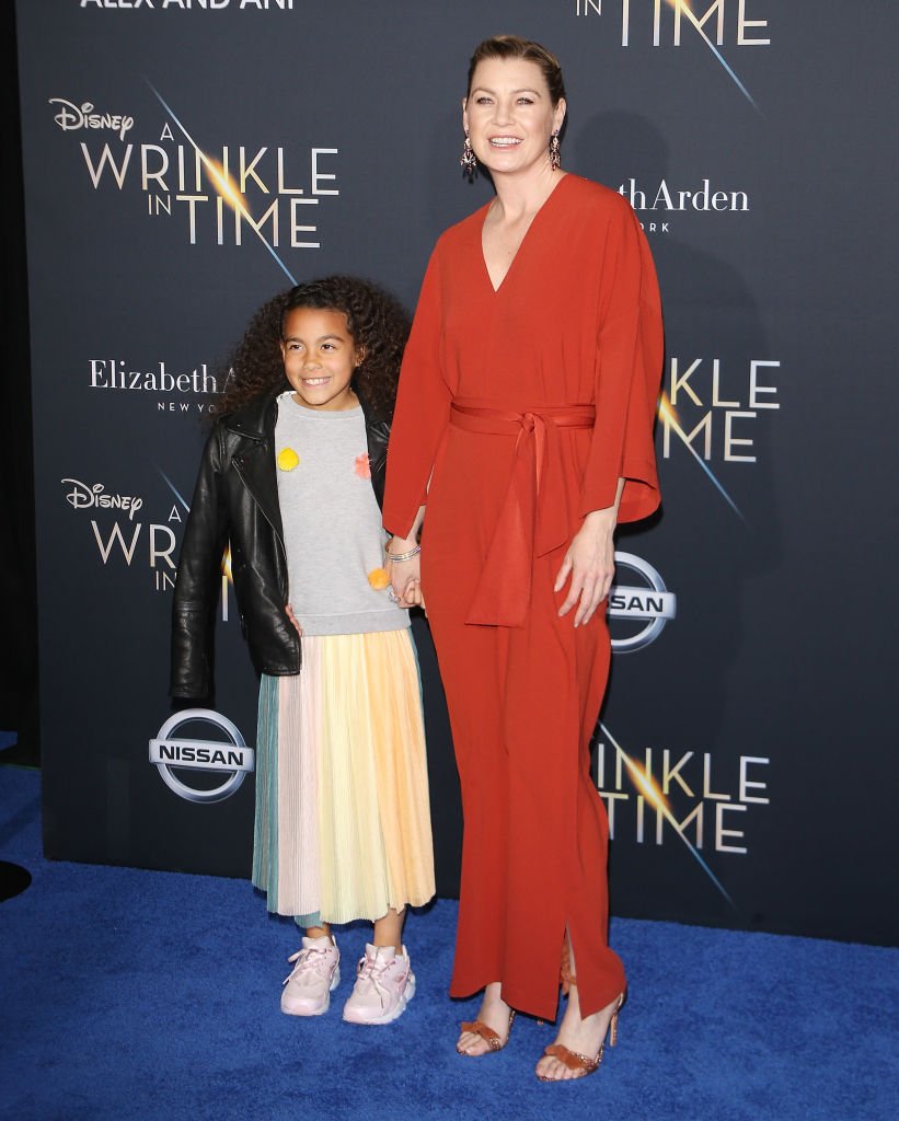 Ellen Pompeo and her daughter arrive at the premiere of the film "A Wrinkle in Time" at the El Capitan Theater on February 26, 2018. | Source: Michael Tran/Getty Images
