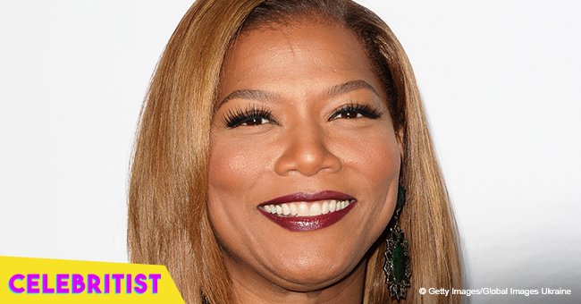 Queen Latifah is all smiles rocking black maxi dress in photo with Gabrielle Union