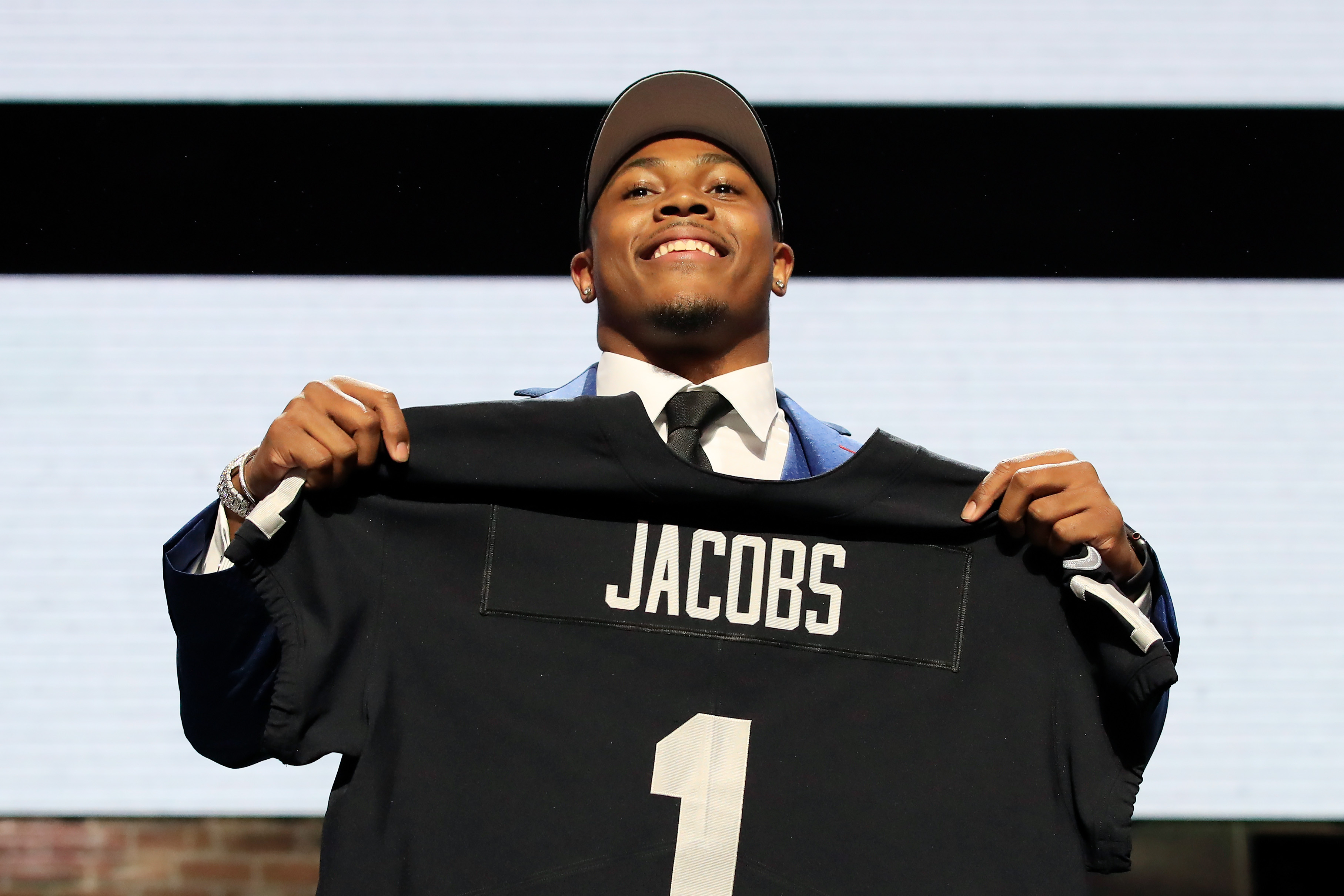 Josh Jacobs of Alabama reacts after being chosen #24 overall by the Oakland Raiders during the first round of the 2019 NFL Draft on April 25, 2019, in Nashville, Tennessee. | Source: Getty Images