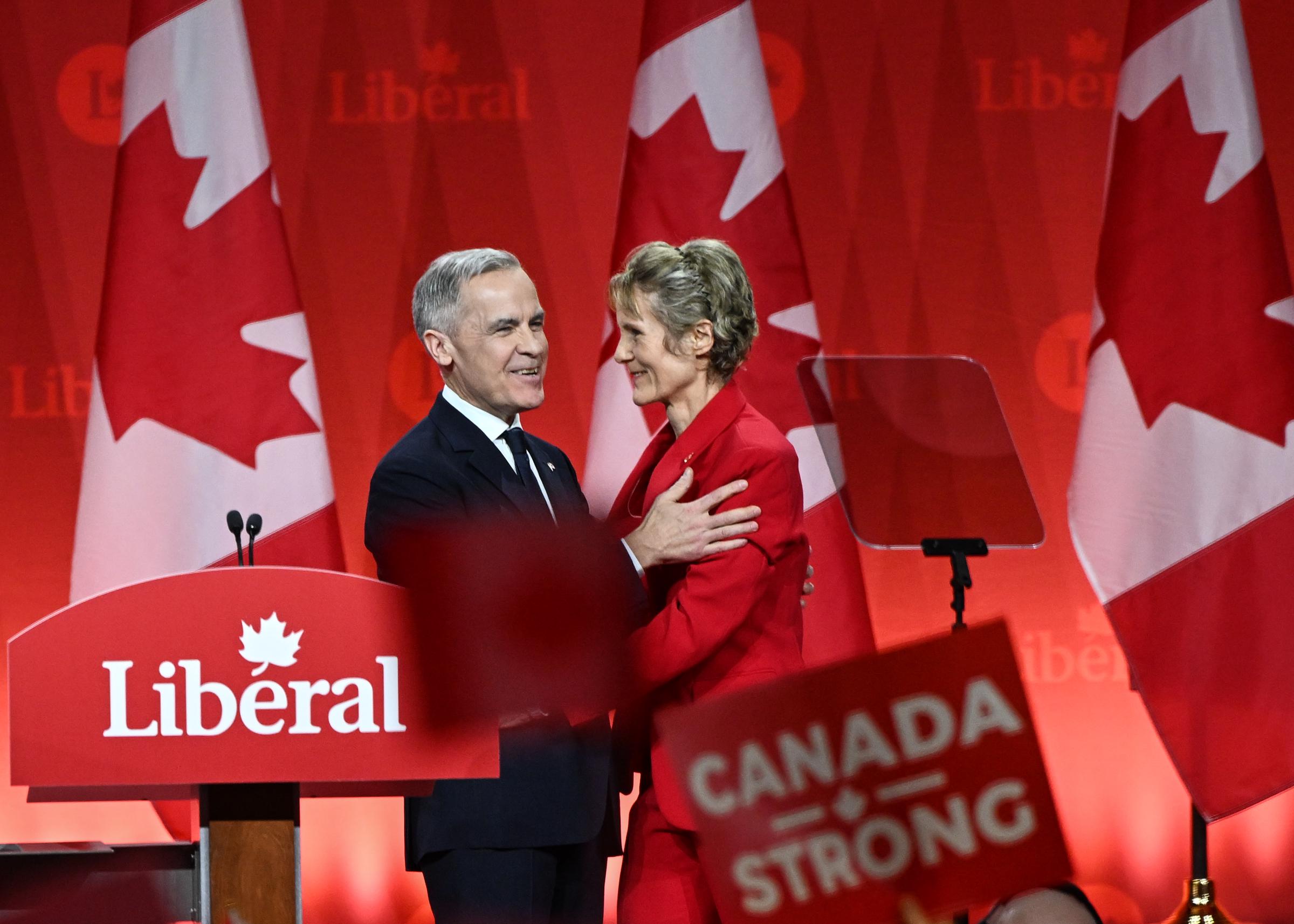 Mark Carney alongside Diana Fox Carney, hug after he is elected as the new Liberal Party leader, in Ottawa, Canada, on March 9, 2025 | Source: Getty Images