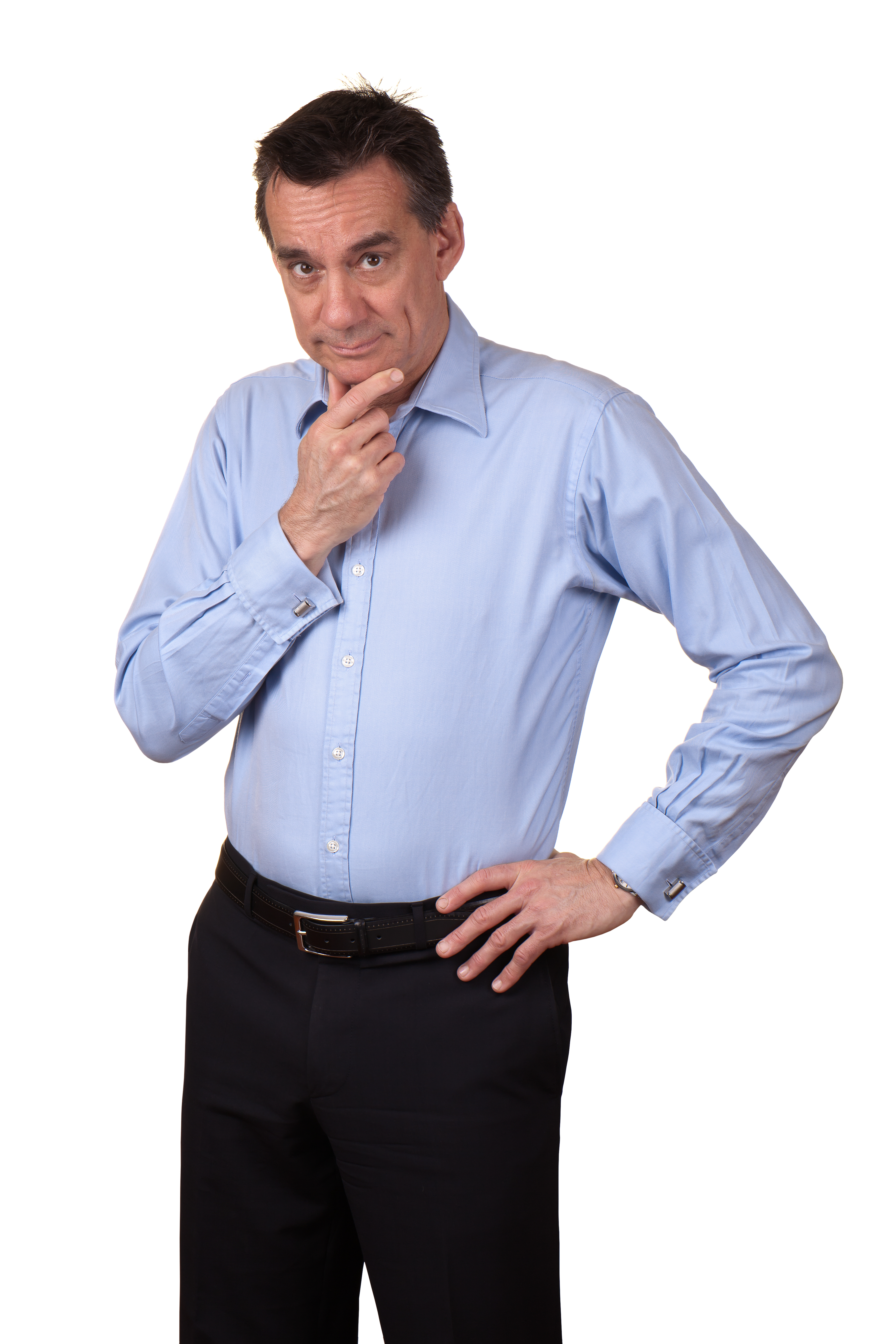 Middle-aged man rubbing his chin | Source: Shutterstock