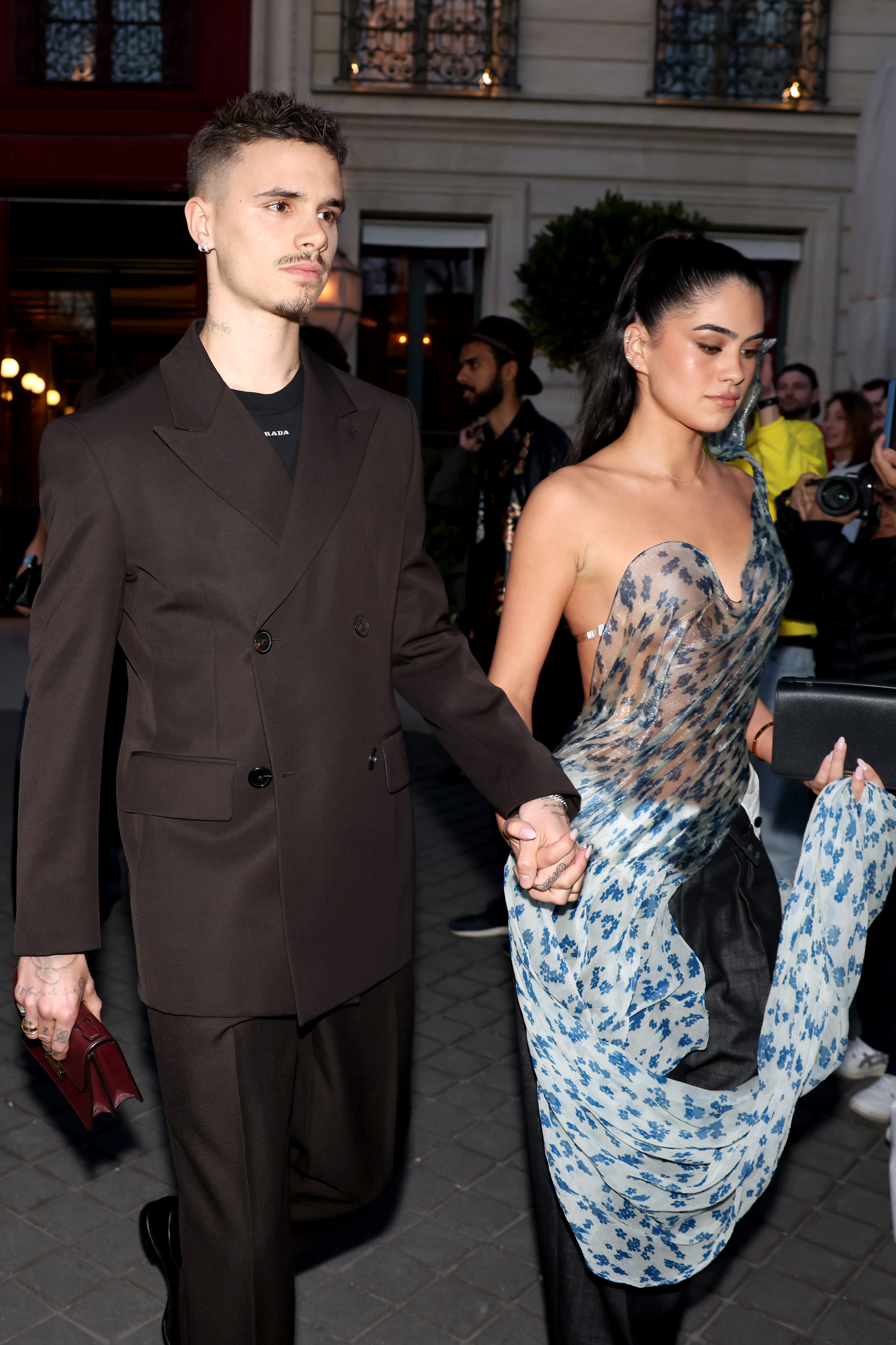 Romeo Beckham and Kim Turnbull. | Source: Getty Images