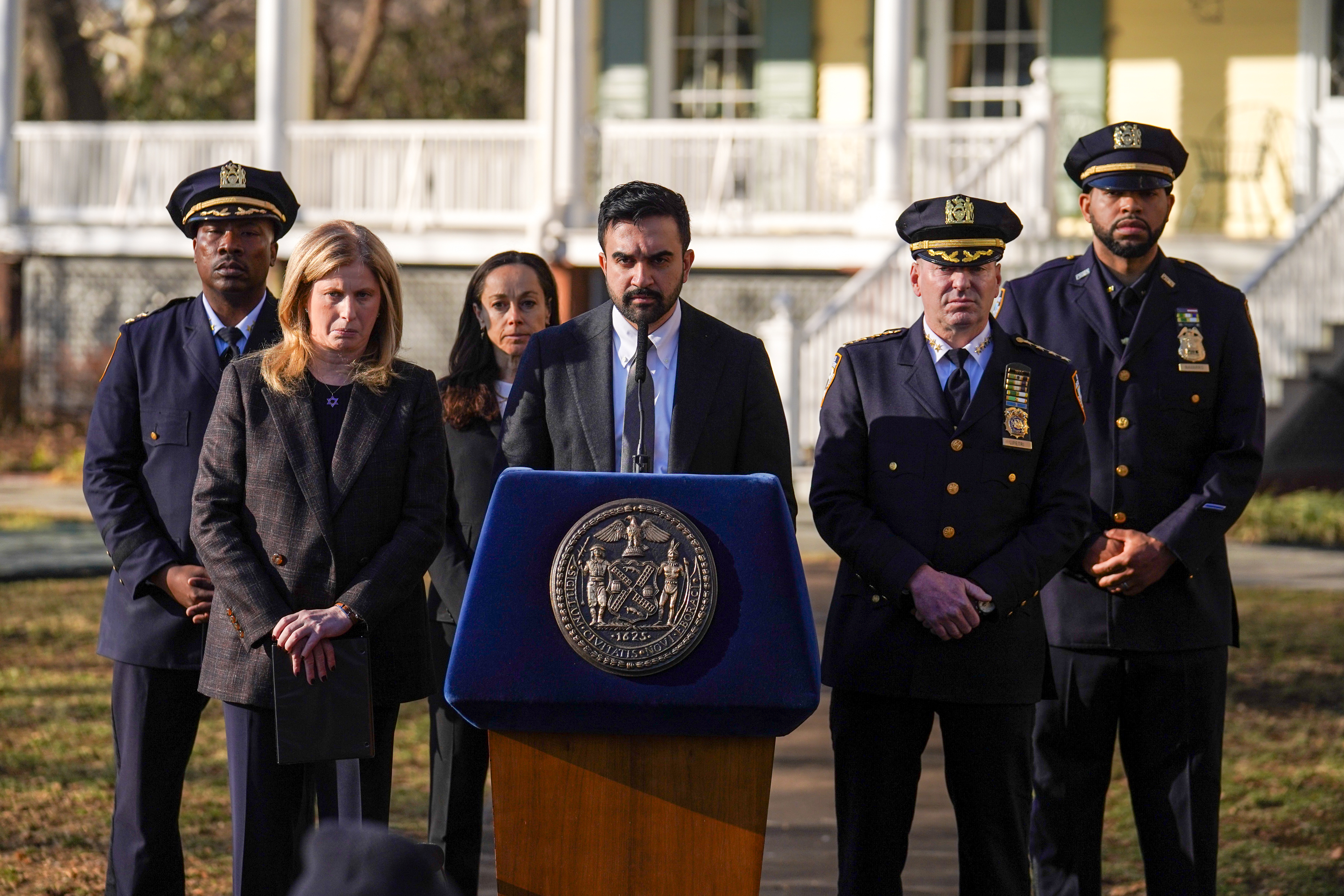 New York Mayor Zohran Mamdani and New York City Police Commissioner Jessica Tisch speak with reporters concerning the attempted bombing at a right-wing protest in front of Gracie Mansion, alongside police officials, in New York City on March 8, 2026. | Source: Getty Images