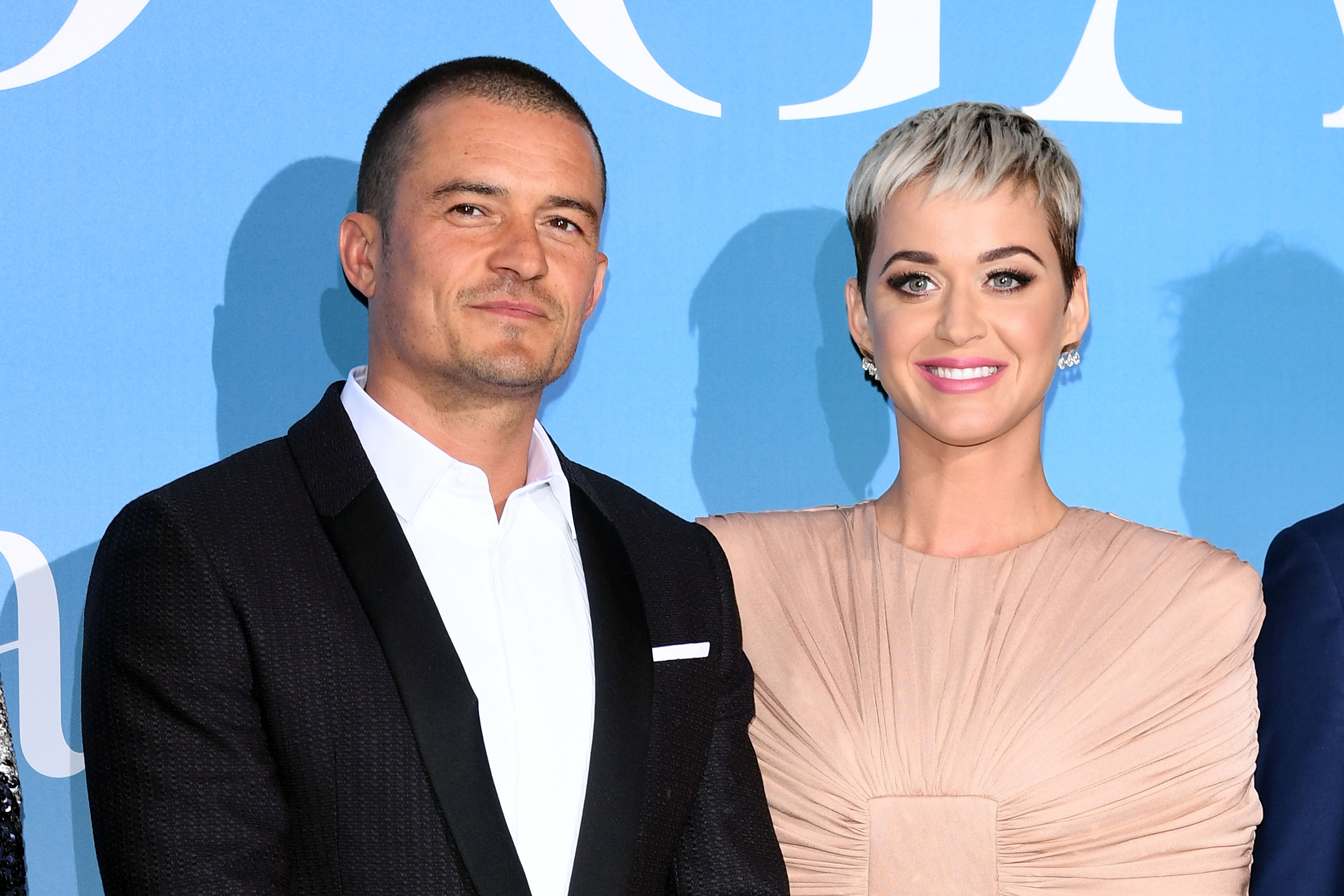 Newly-engaged couple and soon-to-be parents Katy Perry and Orlando Bloom. | Photo: Getty Images