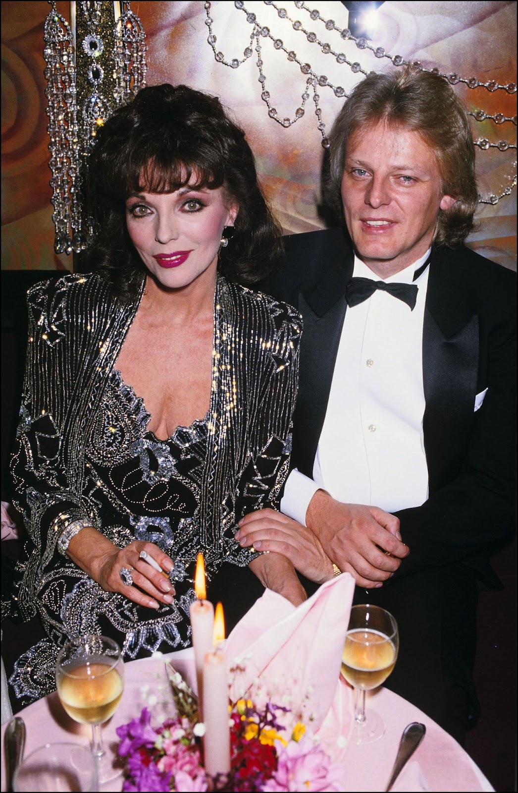 Circa 1985, Joan Collins and Peter Holm appeared together in public. Despite their glamorous appearances, their relationship faced significant challenges, leading Collins to declare she would never marry again after their split. | Source: Getty Images