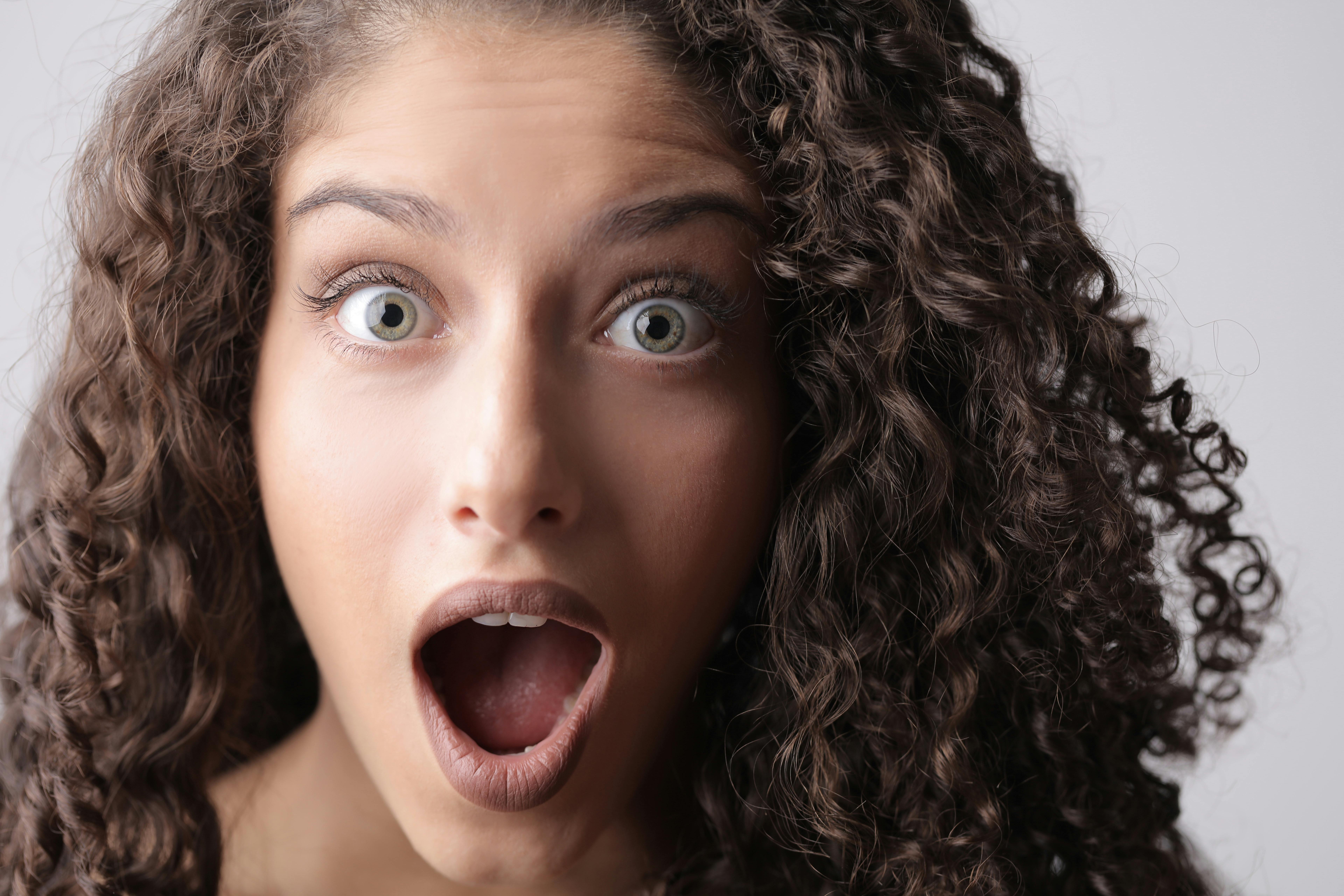 A surprised woman with her mouth wide open | Source: Pexels