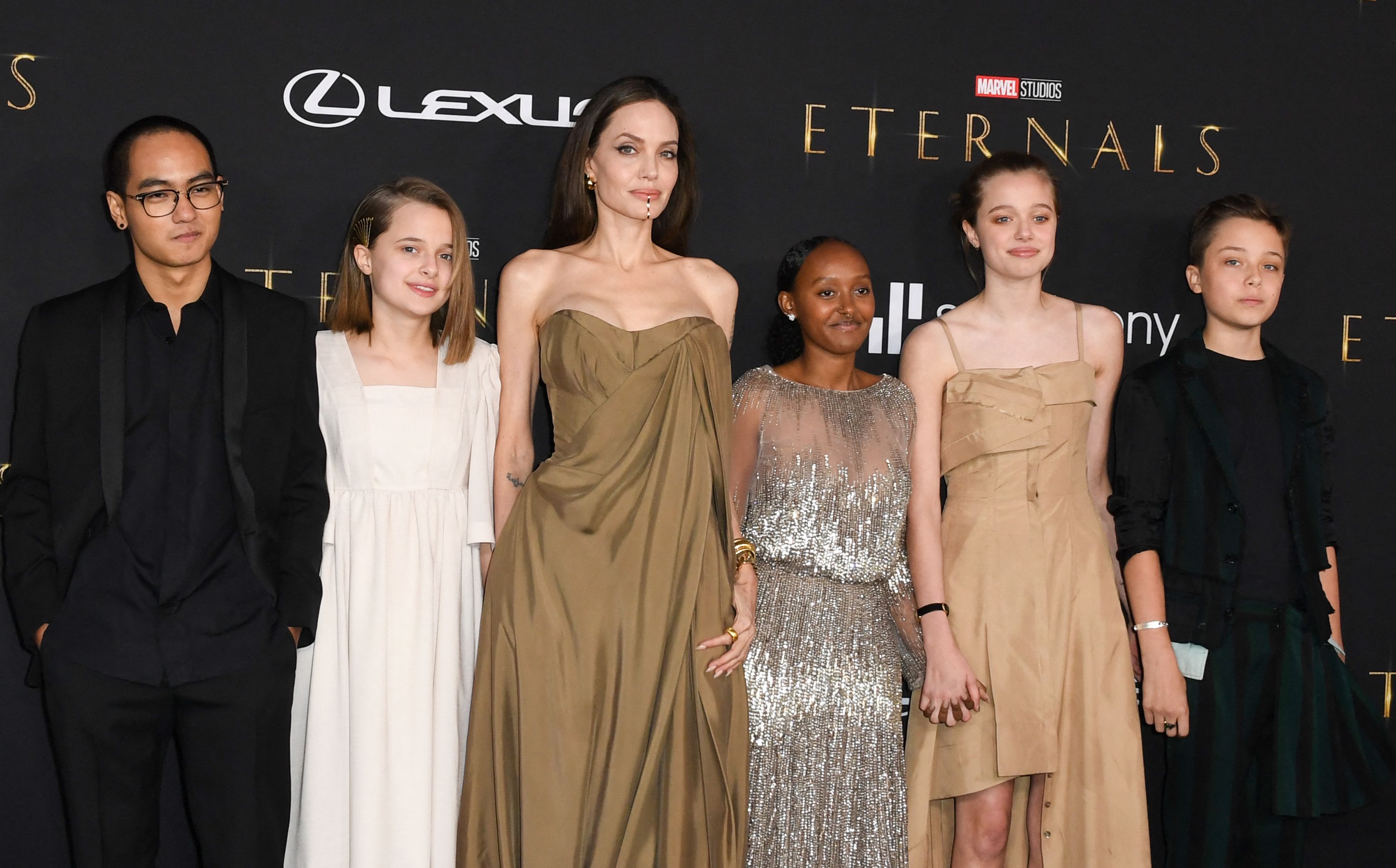 US actress Angelina Jolie and her children Maddox, Vivienne, Zahara, Shiloh, and Knox arrive for the world premiere of Marvel Studios' "Eternals" at the Dolby theatre in Los Angeles, October 18, 2021. | Source: Getty Images