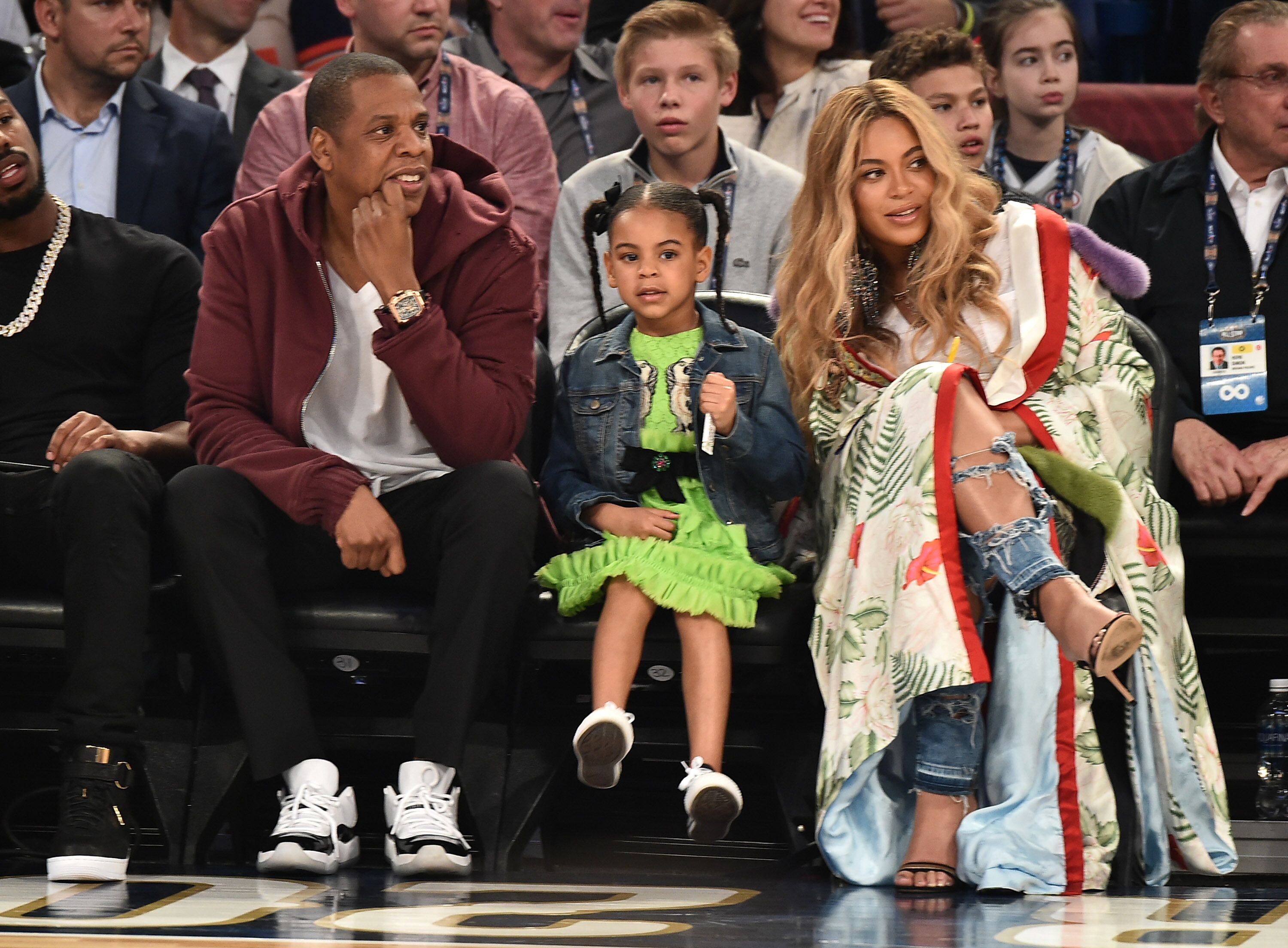 Singer Beyonce, rapper Jay-Z, and daughter Blue Ivy Carter at an NBA All Star game/ Source: Getty Images