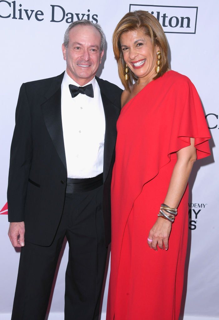 Financier Joel Schiffman (L) and journalist Hoda Kotb attend the Clive Davis and Recording Academy Pre-GRAMMY Gala and GRAMMY Salute to Industry Icons Honoring Jay-Z | Photo: Getty Images