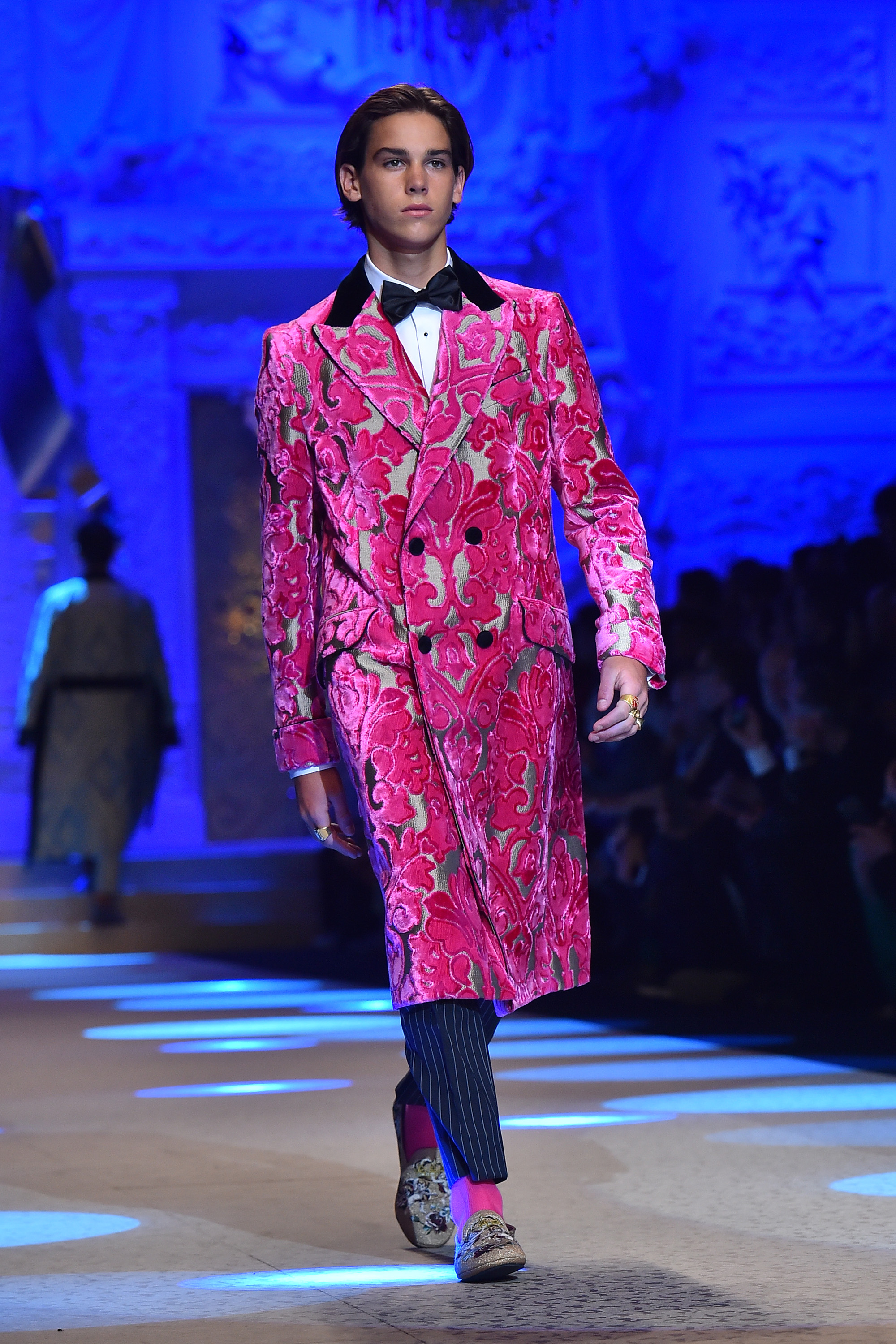 Paris Brosnan walks the runway at the Dolce & Gabbana show during Milan Men's Fashion Week Fall/Winter 2018/19 on January 13, 2018 in Milan, Italy | Source: Getty Images