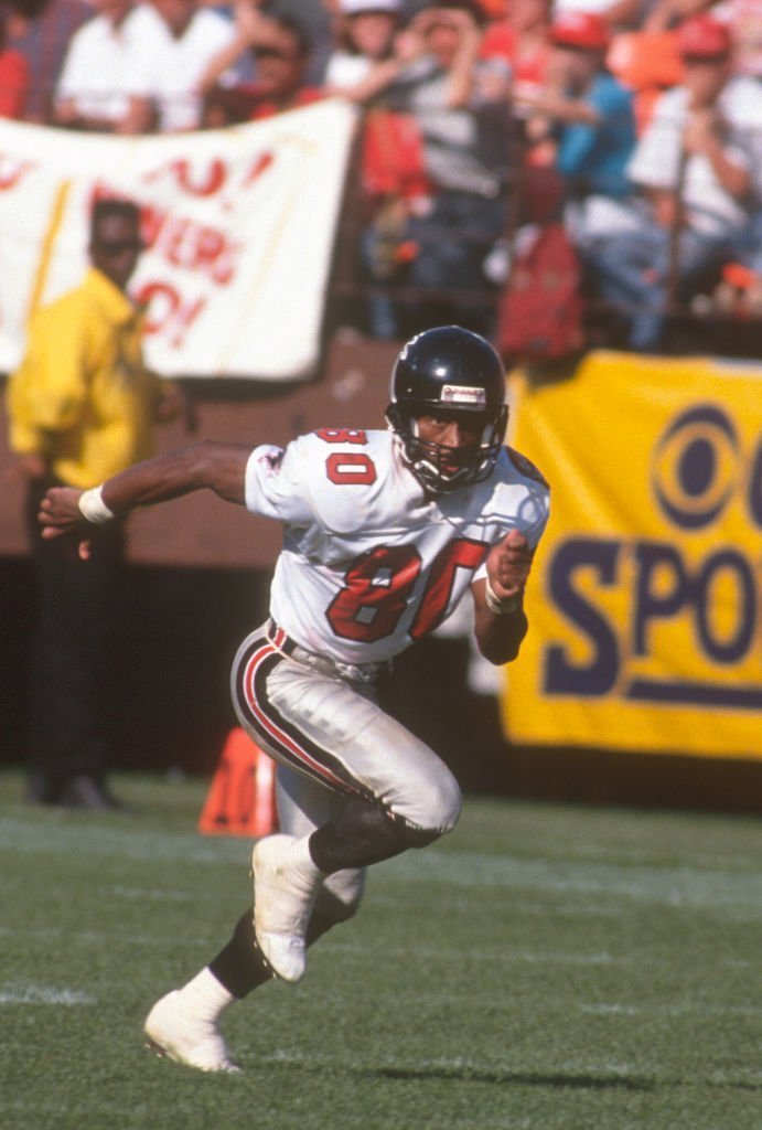 Andre Rison #80 of the Atlanta Falcons runs a pass rout against the San Francisco 49ers during an NFL Football game | Getty Images