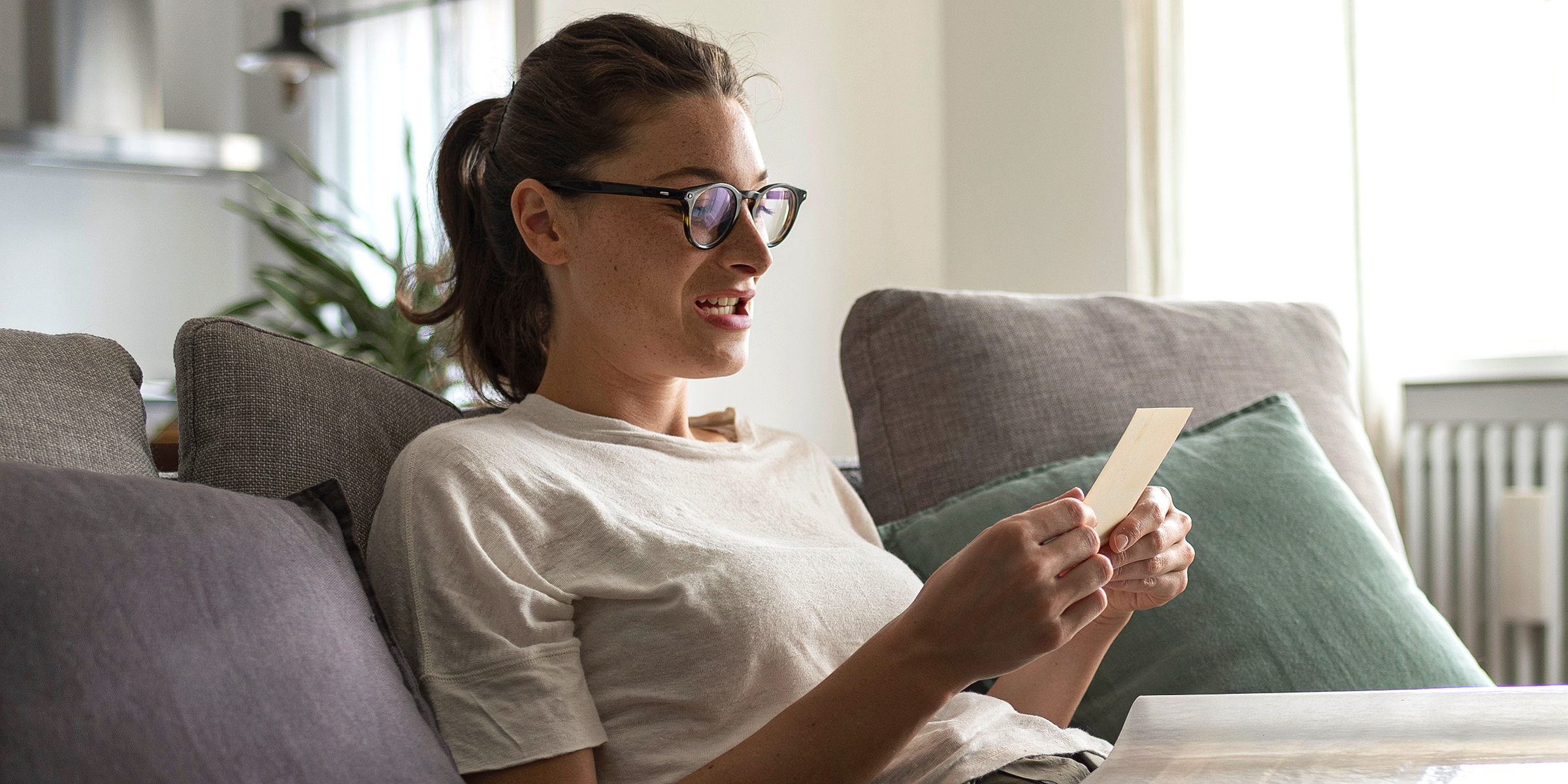 A woman looking at a photo | Source: Shutterstock