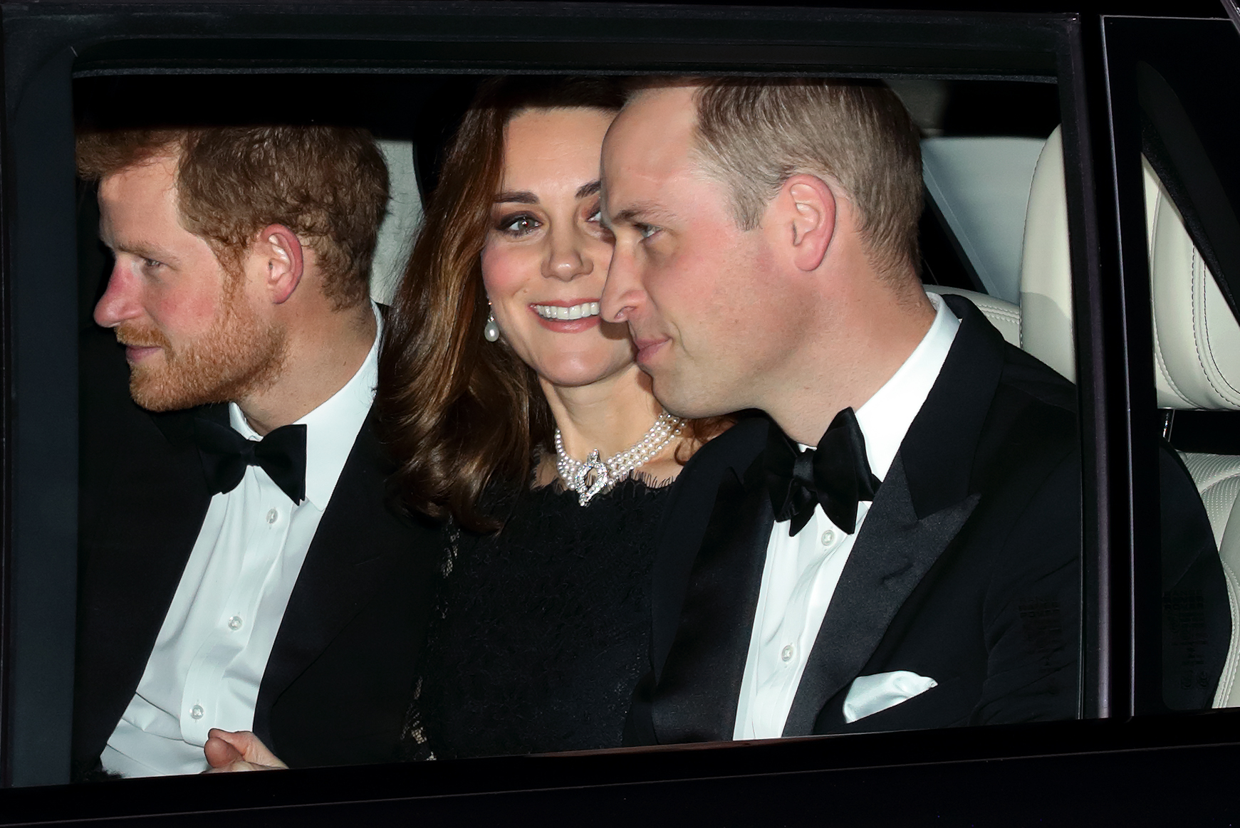 Prince Harry, Catherine, Duchess of Cambridge, and Prince William, Duke of Cambridge arrive at Windsor Castle to attend Queen Elizabeth II's and Prince Philip, Duke of Edinburgh's 70th wedding anniversary dinner in Windsor, England, on November 20, 2017 | Source: Getty Images