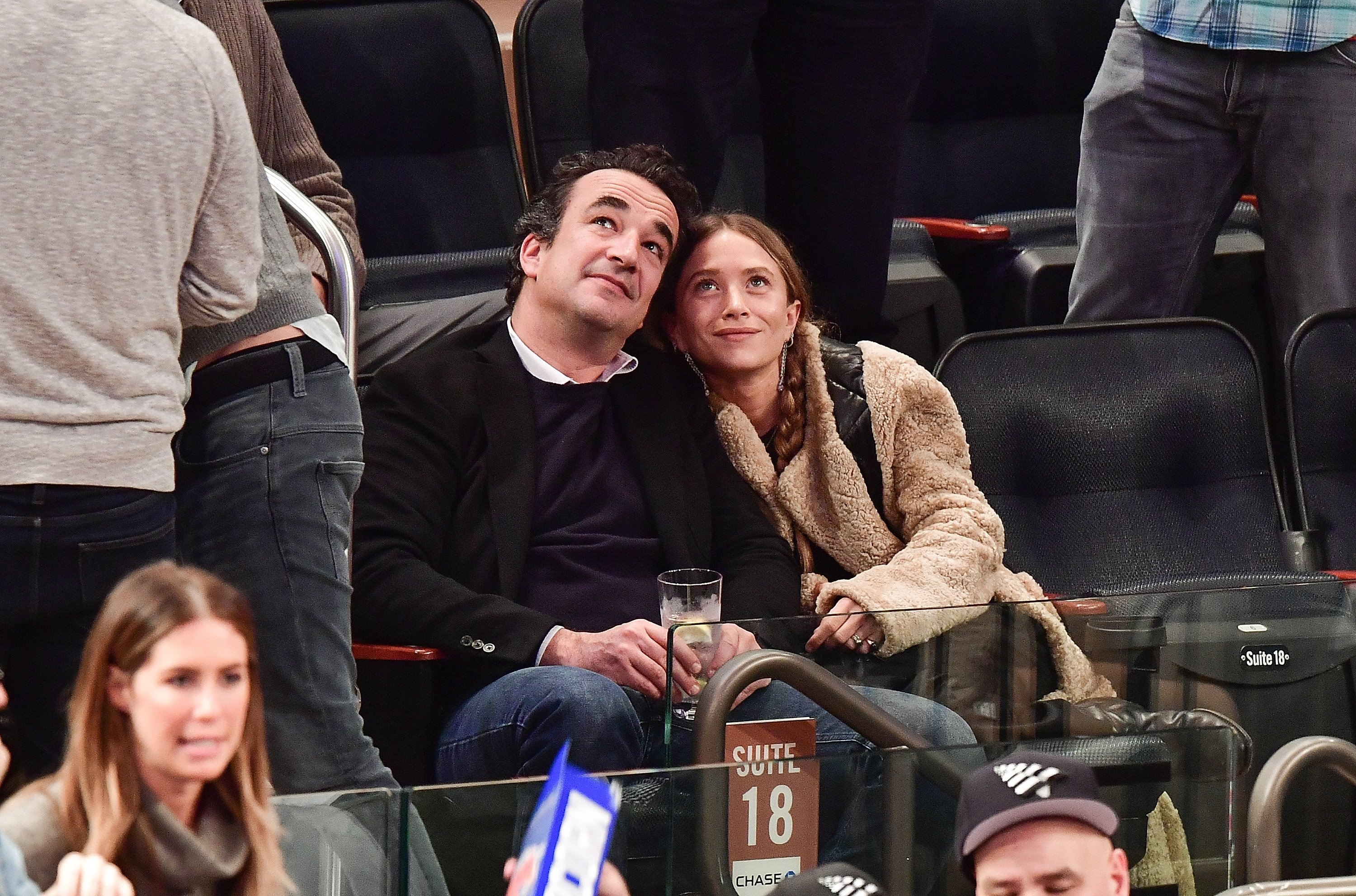 Olivier Sarkozy and Mary-Kate Olsen during New York Knicks vs Brooklyn Nets game at Madison Square Garden on November 9, 2016 in New York City. / Source: Getty Images