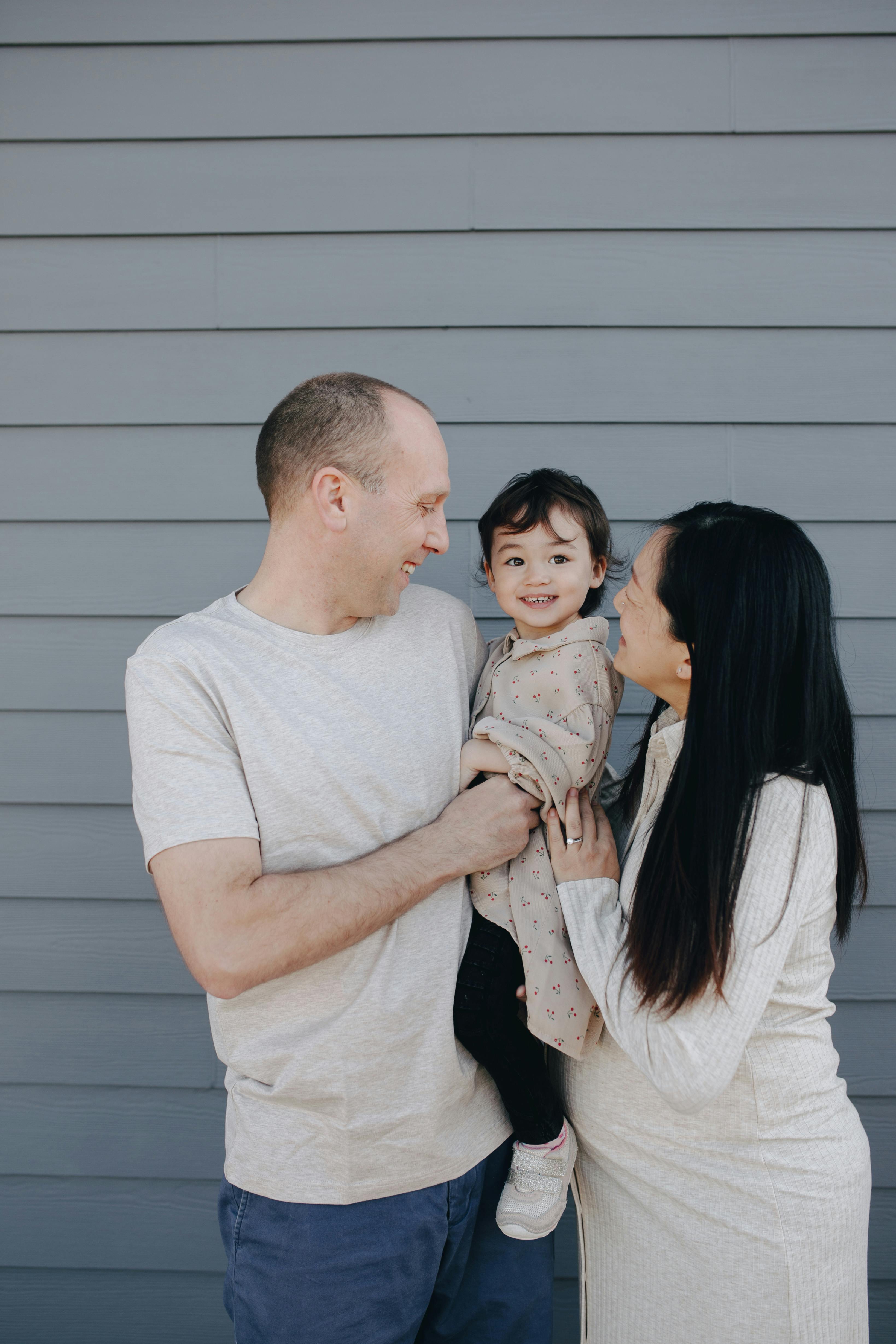 A happy family of three | Source: Pexels