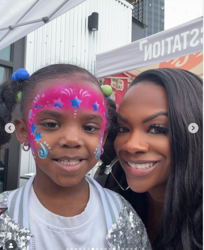 Blaze Tucker has a face paint as her mother Kandi Burruss take photo with her,  as seen in a post dated November 22, 2025. | Source: Instagram/kandi