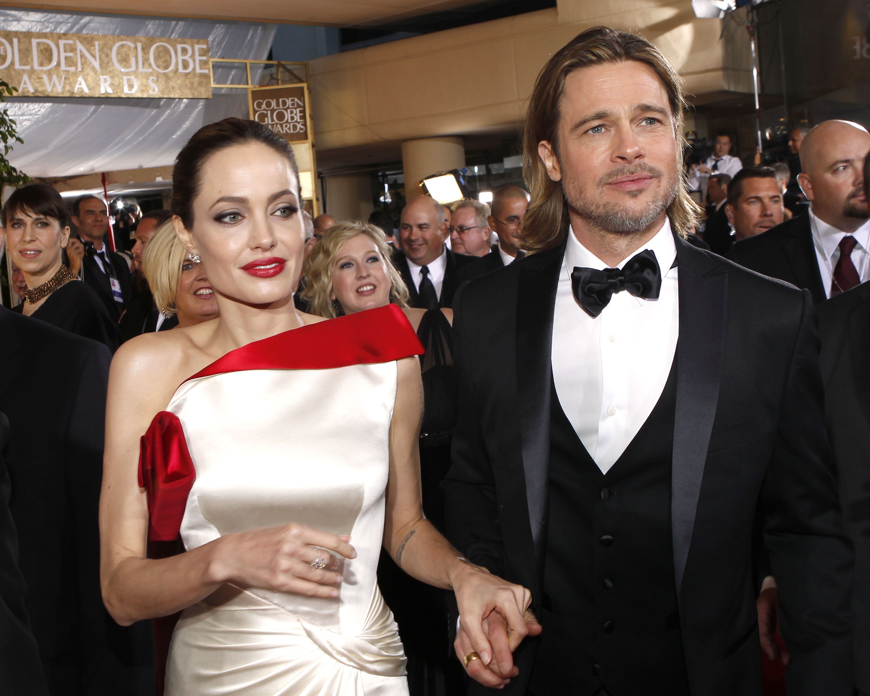 Angelina Jolie and Brad Pitt arrive at the 69th Annual Golden Globe Awards held at the Beverly Hilton Hotel on January 15, 2012. | Source: Getty Images