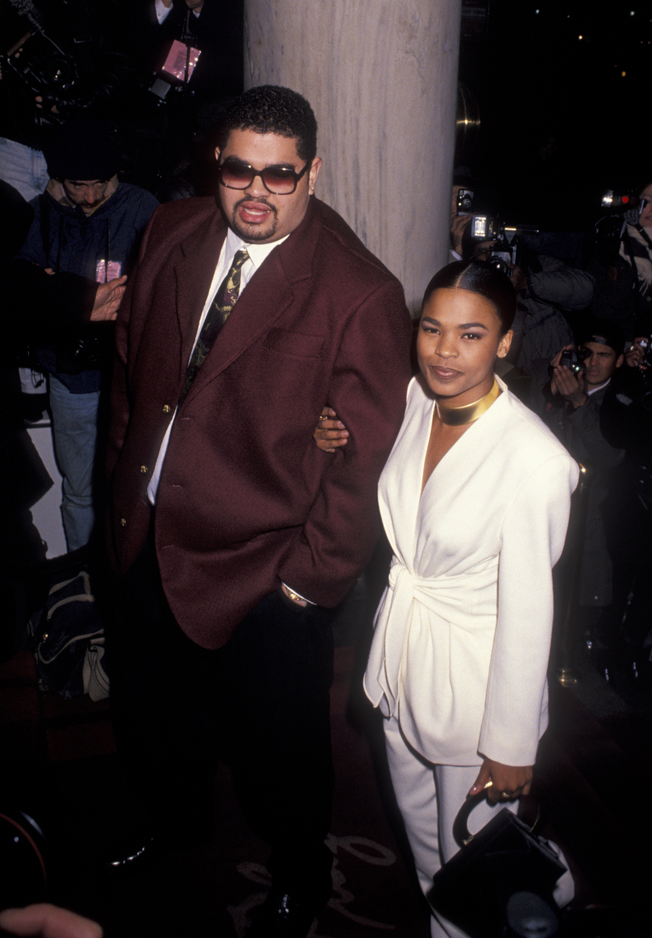Heavy D and Nia Long attend the Eddie Murphy-Nicole Mitchell Wedding Ceremony on March 18, 1993, at the Plaza Hotel in New York City.