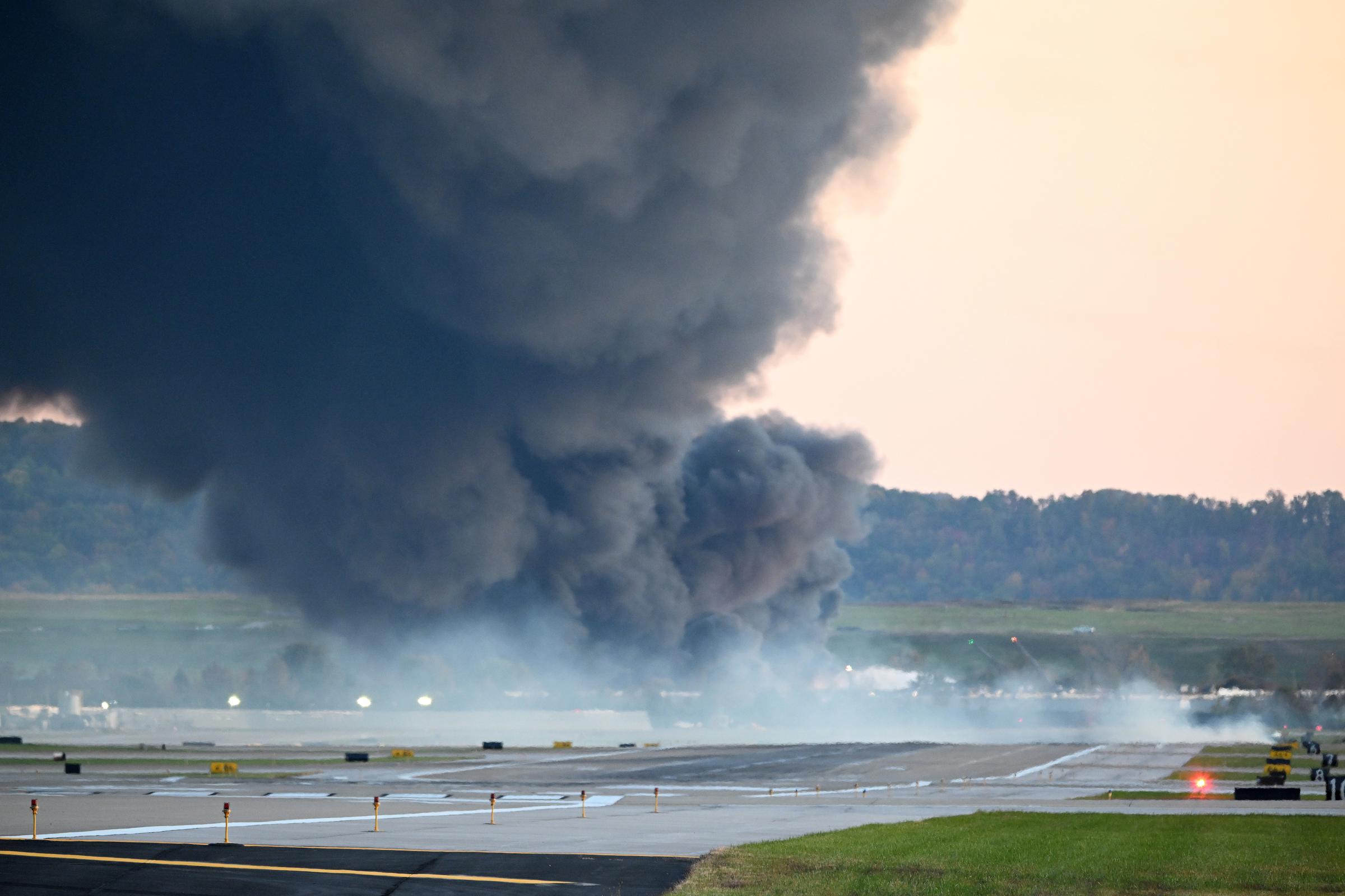 The plumes of smoke in the aftermath of the UPS cargo plane tragedy at Louisville Muhammad Ali International Airport. | Source: Getty Images