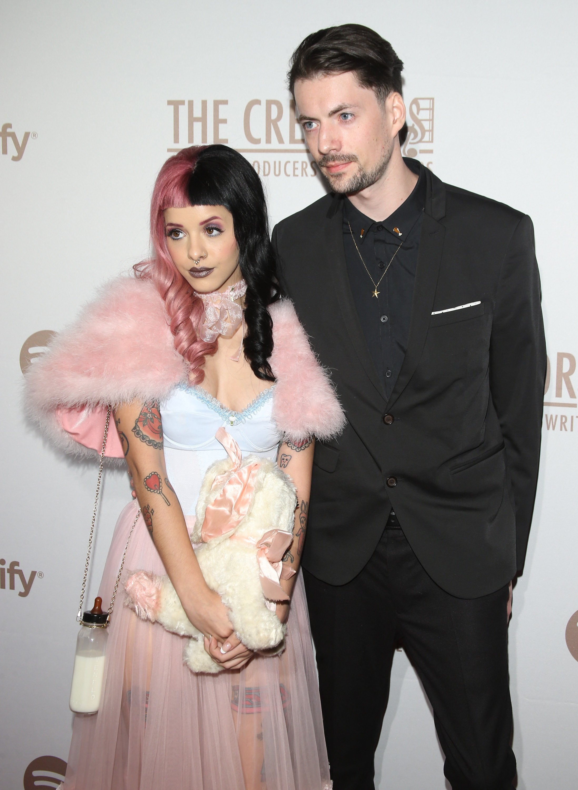 Melanie Martinez (L) and Michael Keenan at The Creators Party presented by Spotify, held at Cicada, on February 13, 2016, in Los Angeles, California. | Source: Getty Images