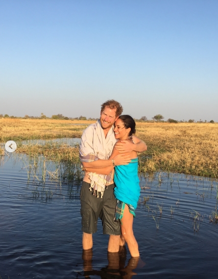 Meghan Markle and Prince Harry embrace while standing in the water in a sun-soaked image shared in a post dated January 17, 2026. | Source: Instagram/meghan