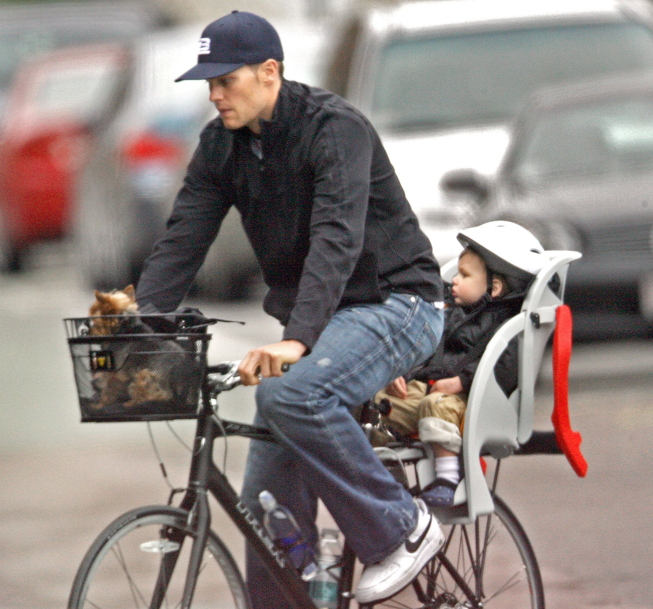 Tom Brady, his son Jack pictured during a bike ride on May 27, 2009 in Boston, Massachusetts ┃Source: Getty Images