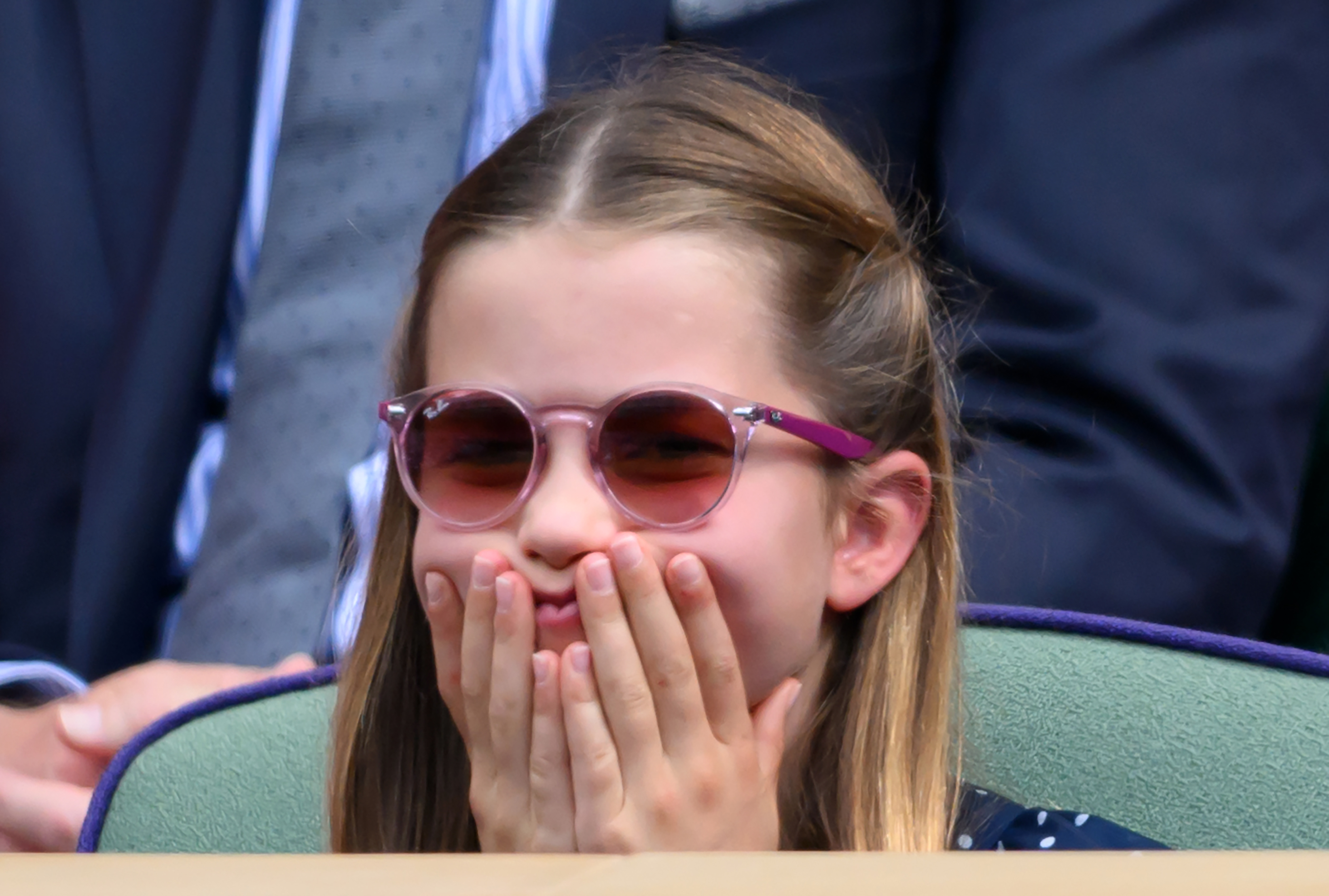 Princess Charlotte's in a playful mood while attending the men's finals at Wimbledon in London on July 14, 2024 | Source: Getty Images