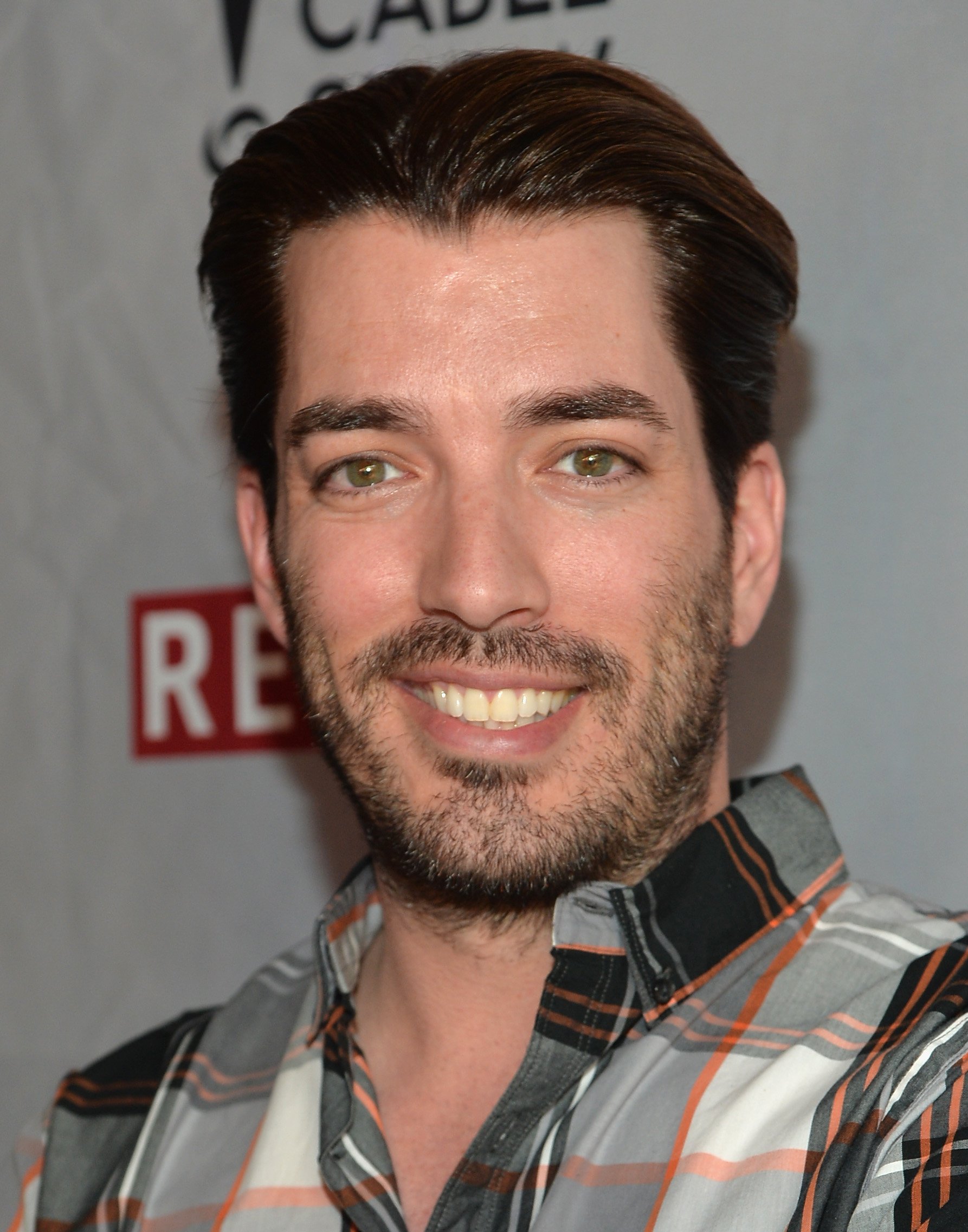TV personality Jonathan Scott attends REVOLT and The National Cable and Telecommunications Association's Celebration of Cable at Belasco Theater on April 30, 2014 in Los Angeles, California | Source: Getty Images