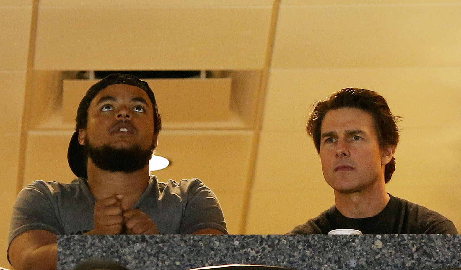 Connor Kidman-Cruise and Tom Cruise watch a game during the NCAA Women's Final Four Semifinal on April 5, 2015, in Tampa, Florida | Source: Getty Images