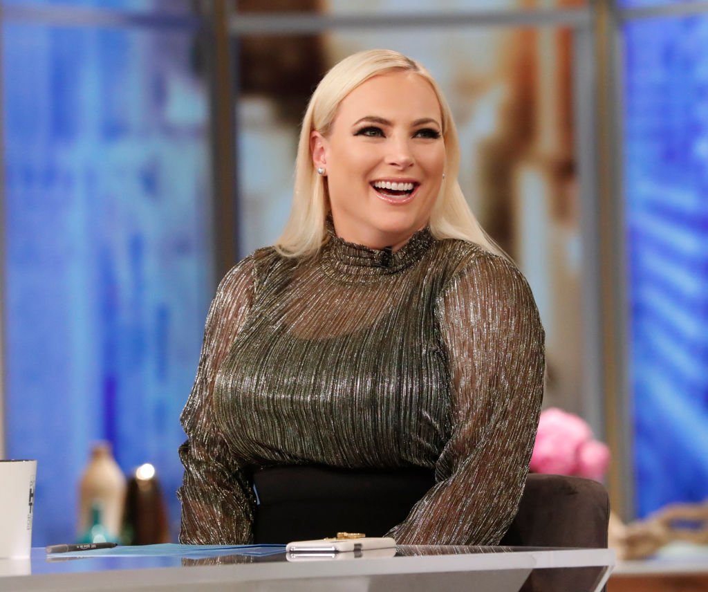 Meghan McCain on the set of "The View" with a smile on her face. | Photo: Getty Images