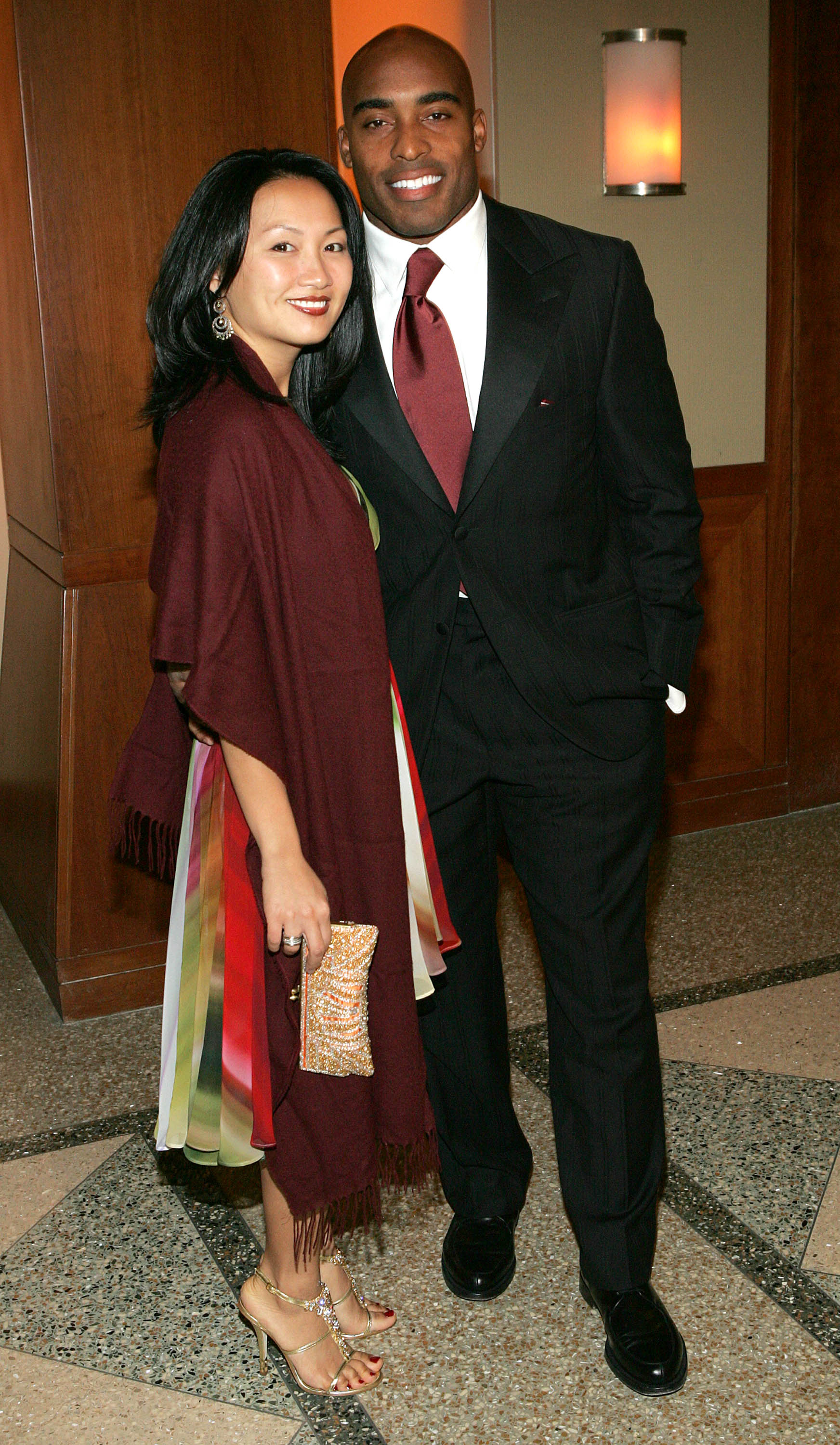 Tiki Barber and Ginny Cha attend The Fresh Air Fund: An Evening In Oz Benefit at Chelsea Piers November 18, 2004, in New York City. | Source: Getty Images